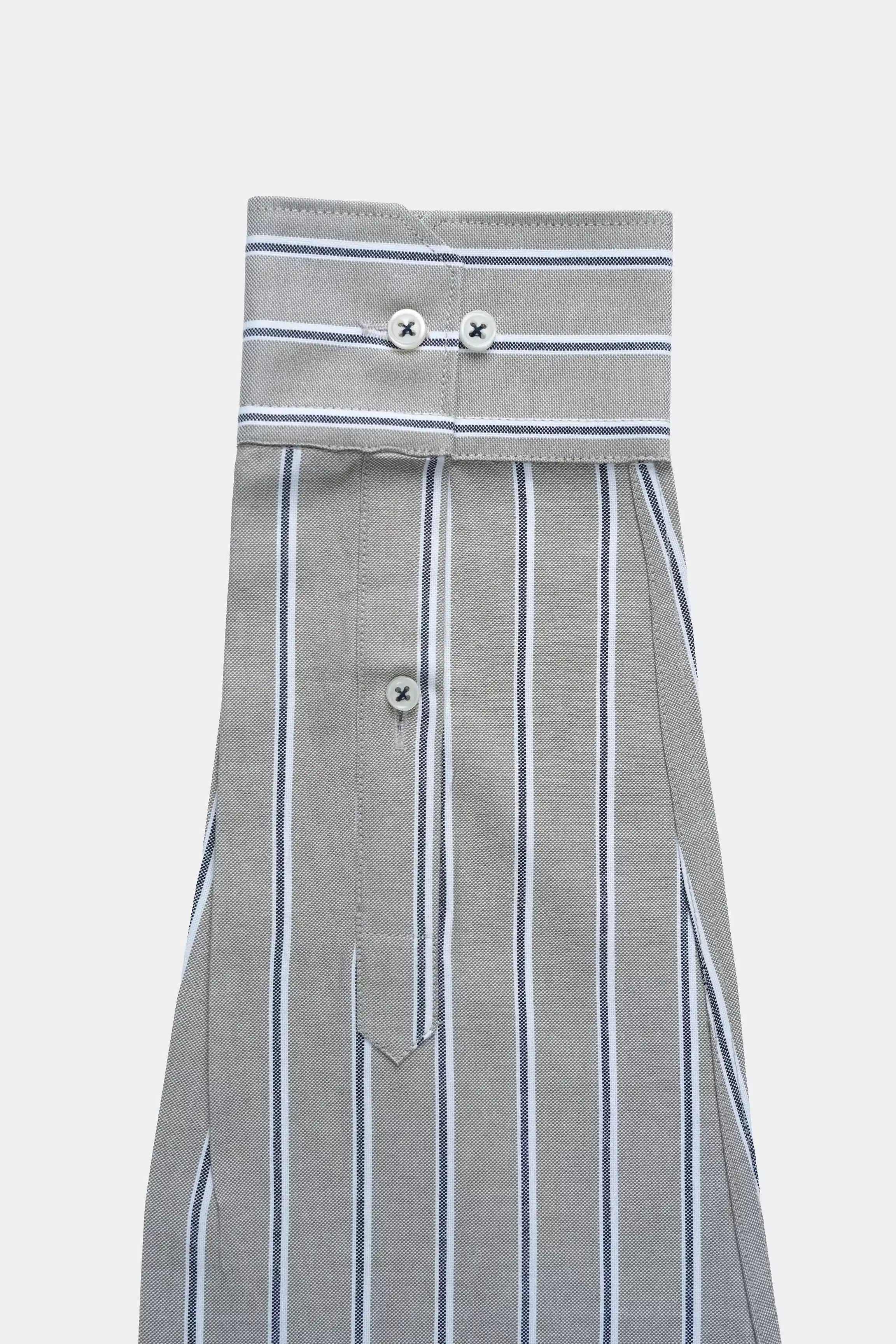 Striped smart shirt front with buttoned placket and vertical blue lines, light green