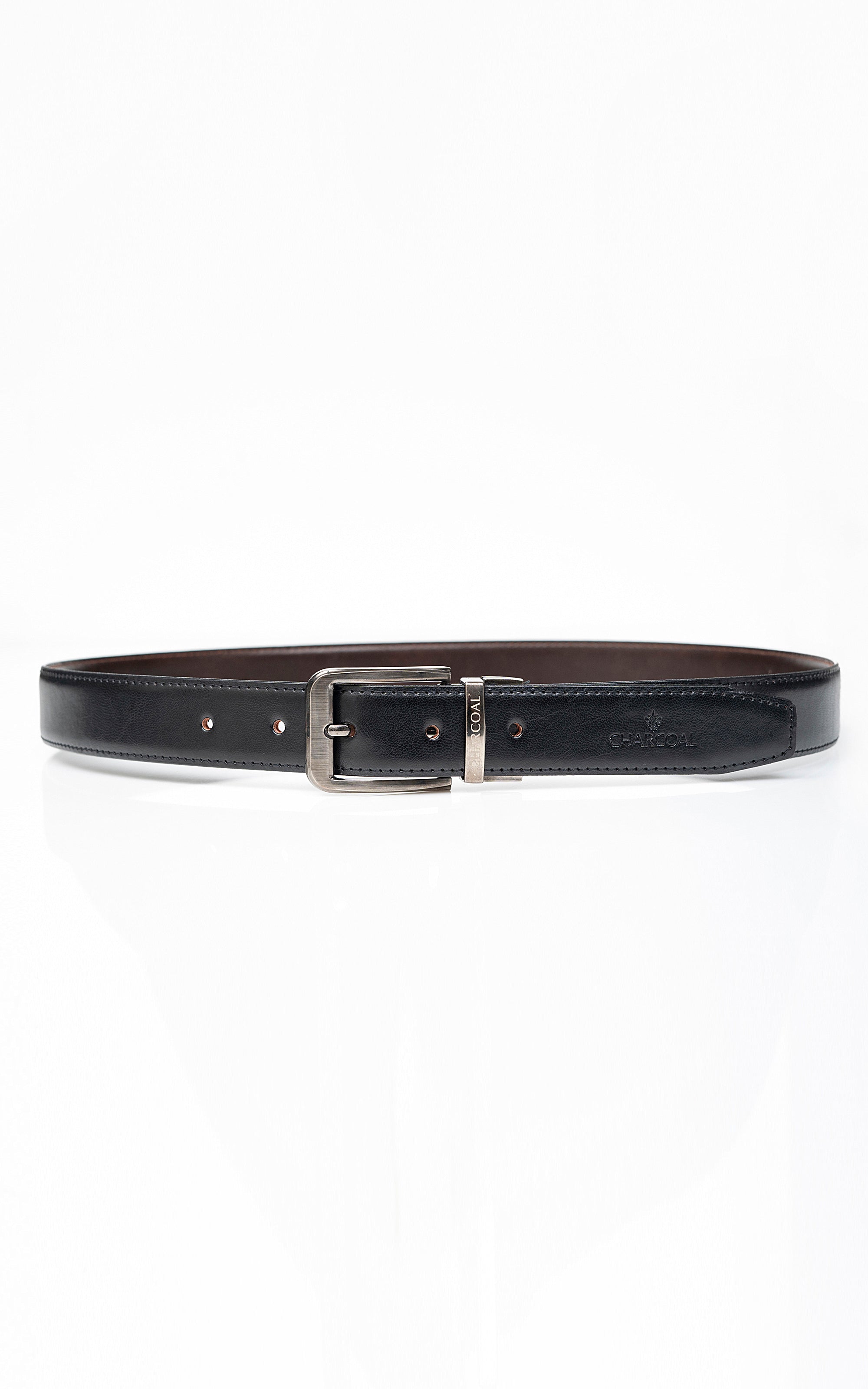 Reversible belt with dark leather outer, silver square buckle, and stitched strap edges.