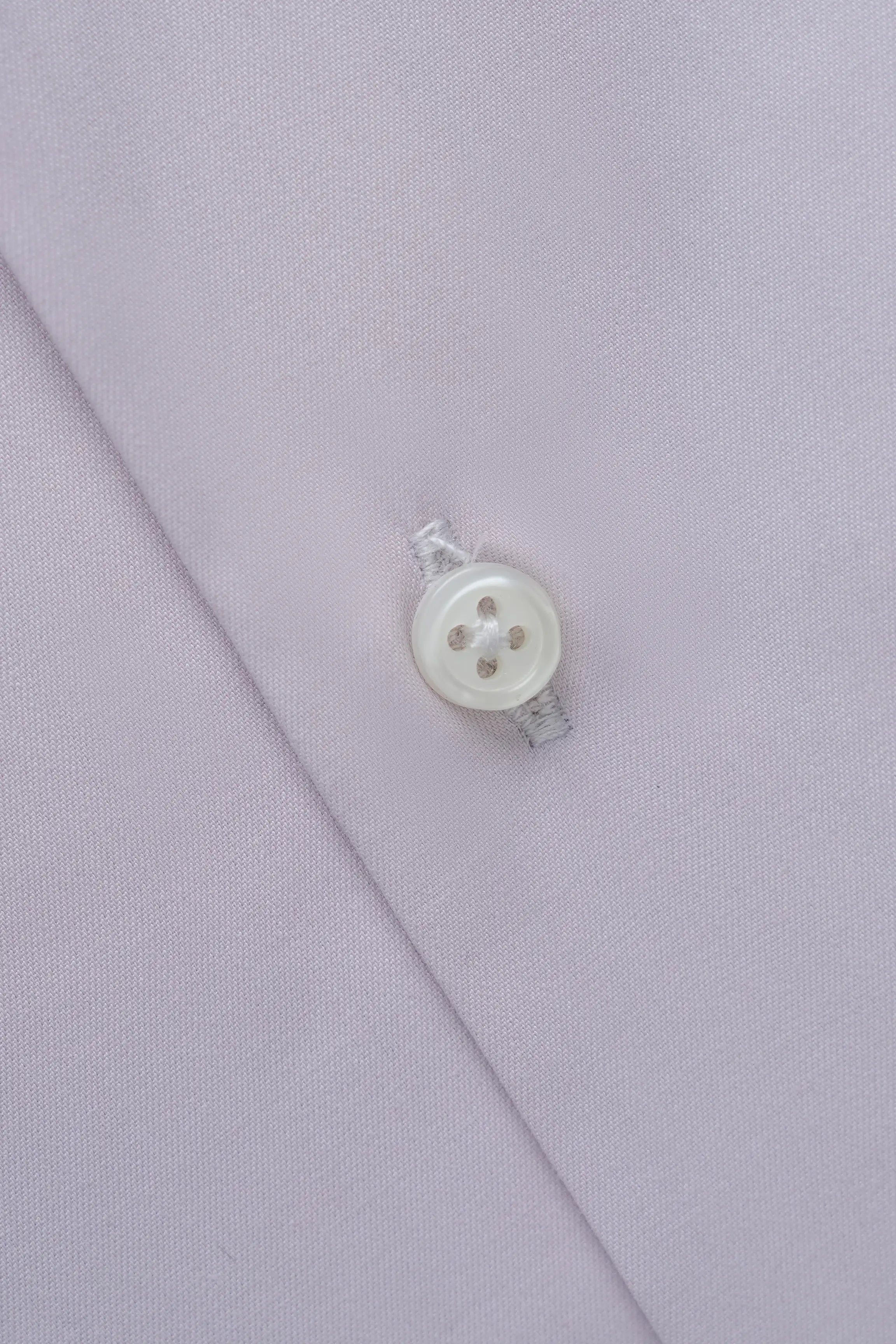 Tea pink dress shirt button with white buttons and stitched front seam