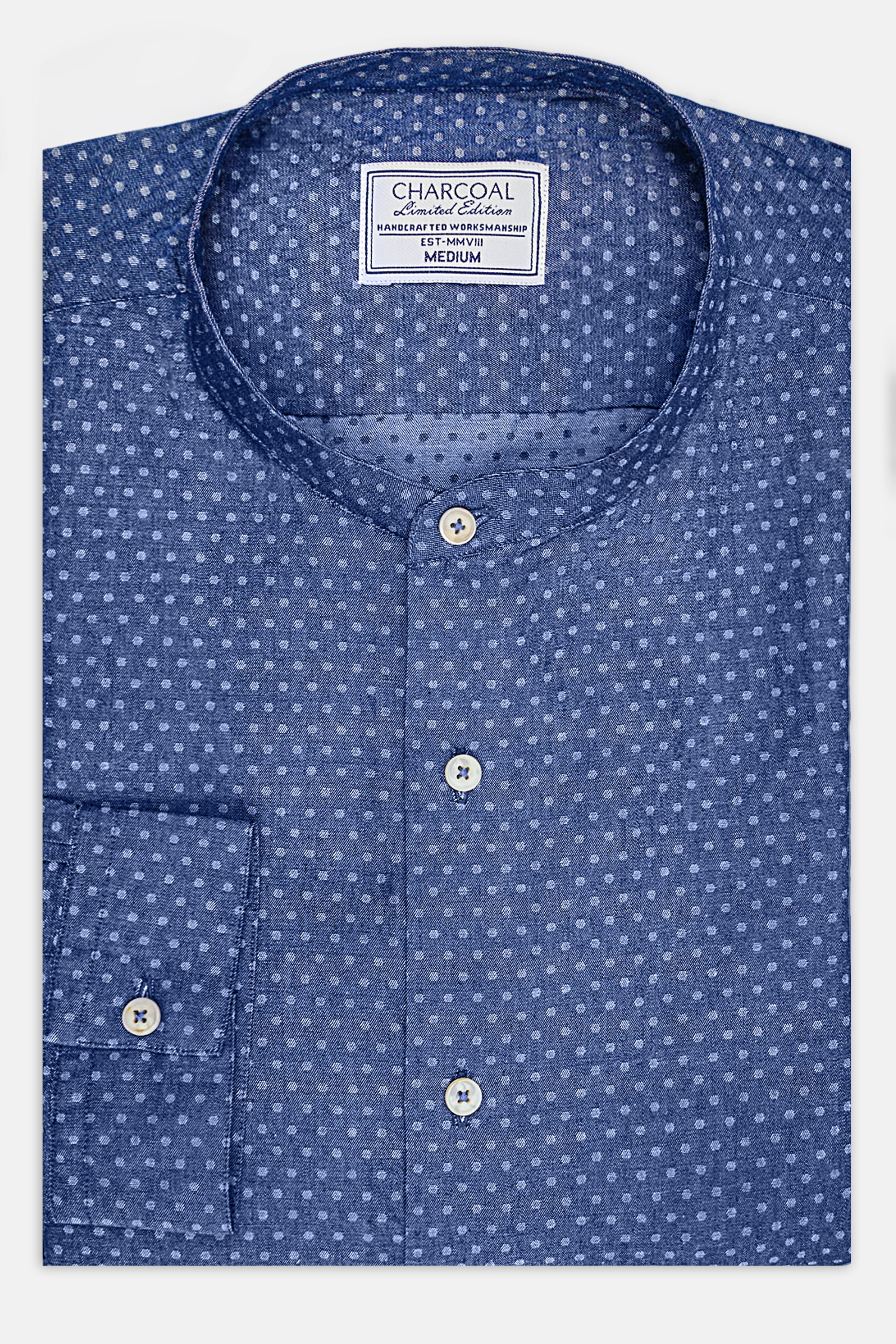 Blue dress shirt with dotted texture, button placket and neck label