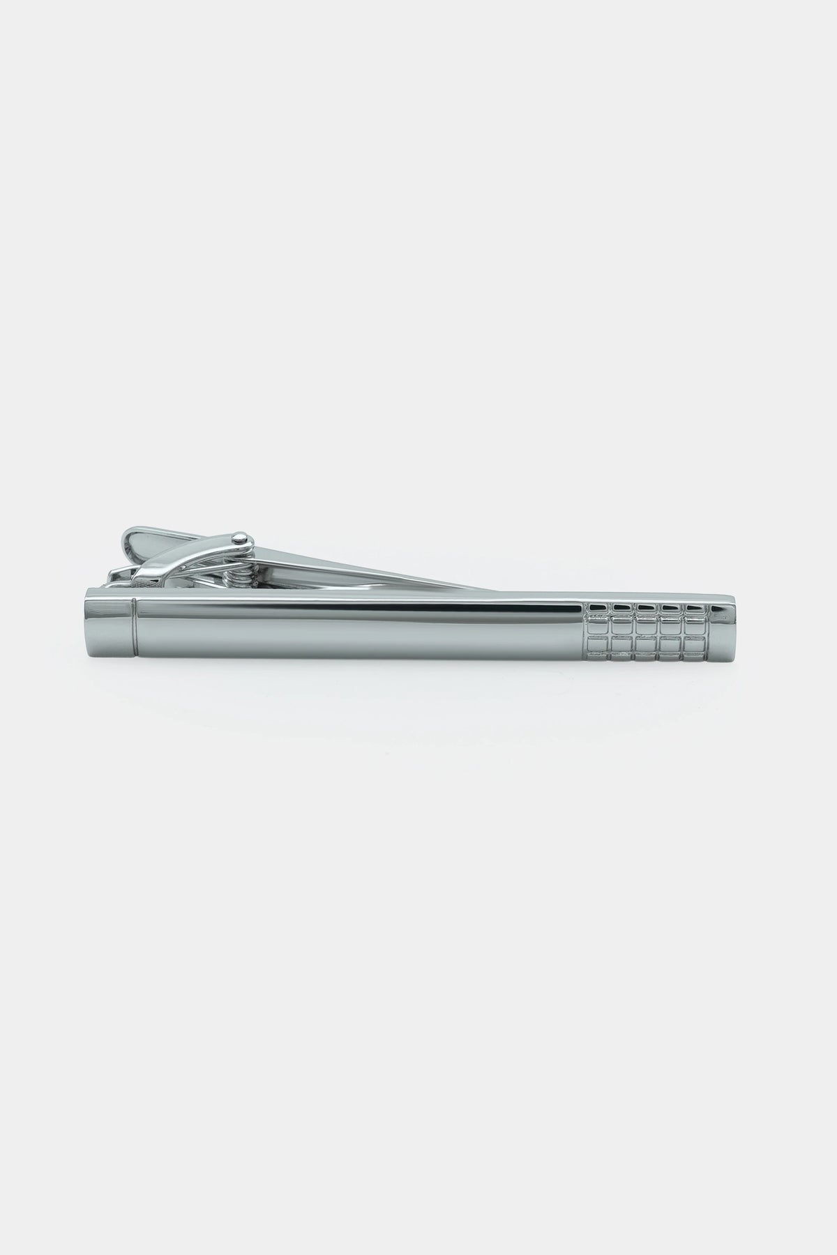 Silver tie pin with top clasp and ridged grip section along the rectangular bar
