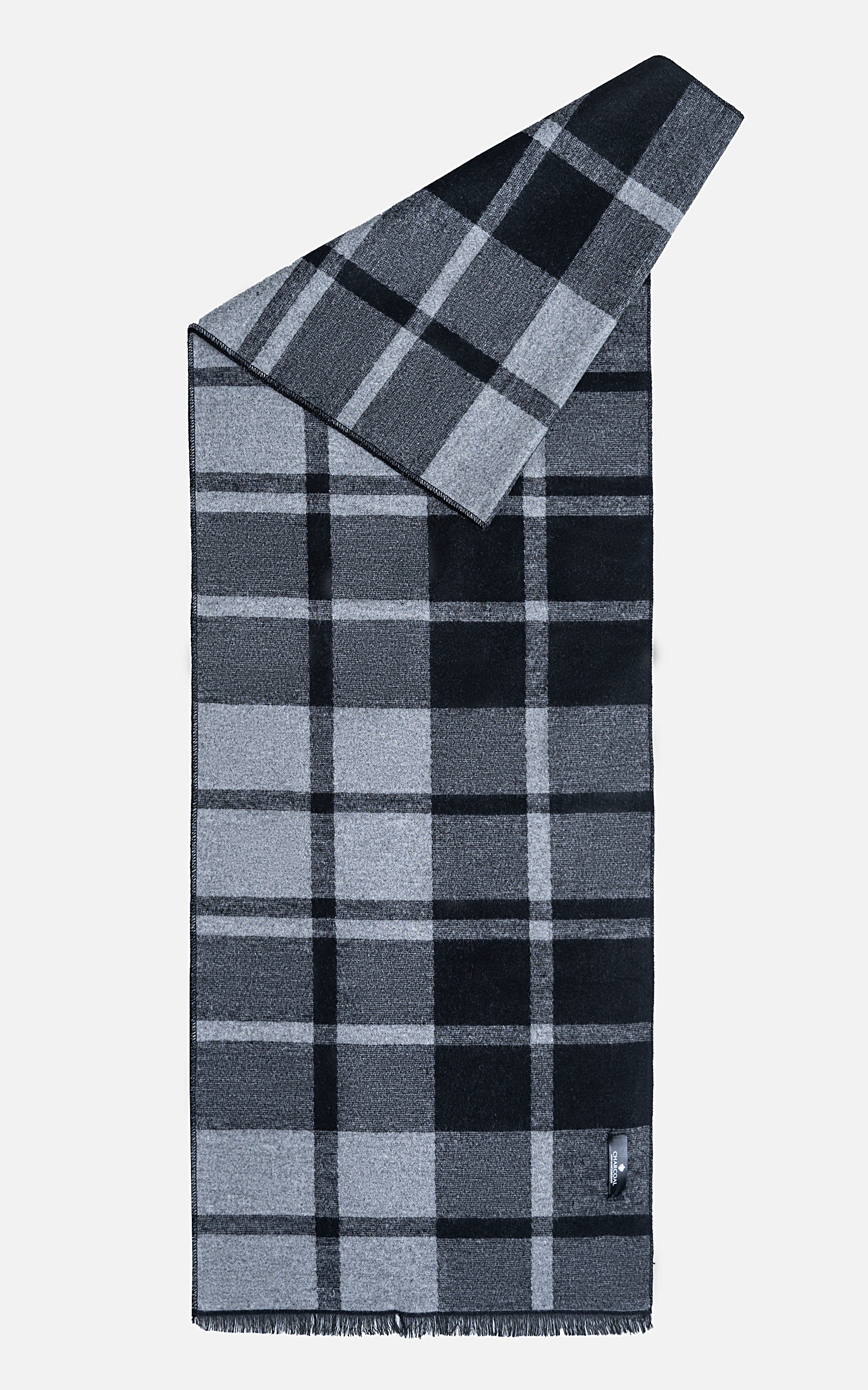 Plaid scarf with dark and light gray squares, fringed edges, folded end