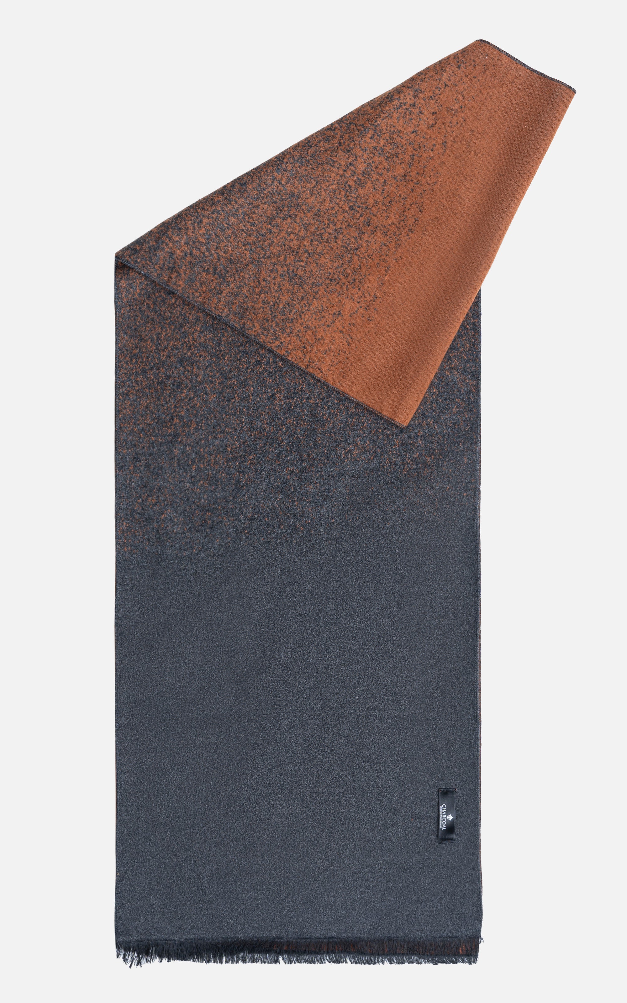 Rust-brown and dark charcoal scarf, textured fabric with fringed ends and small logo label