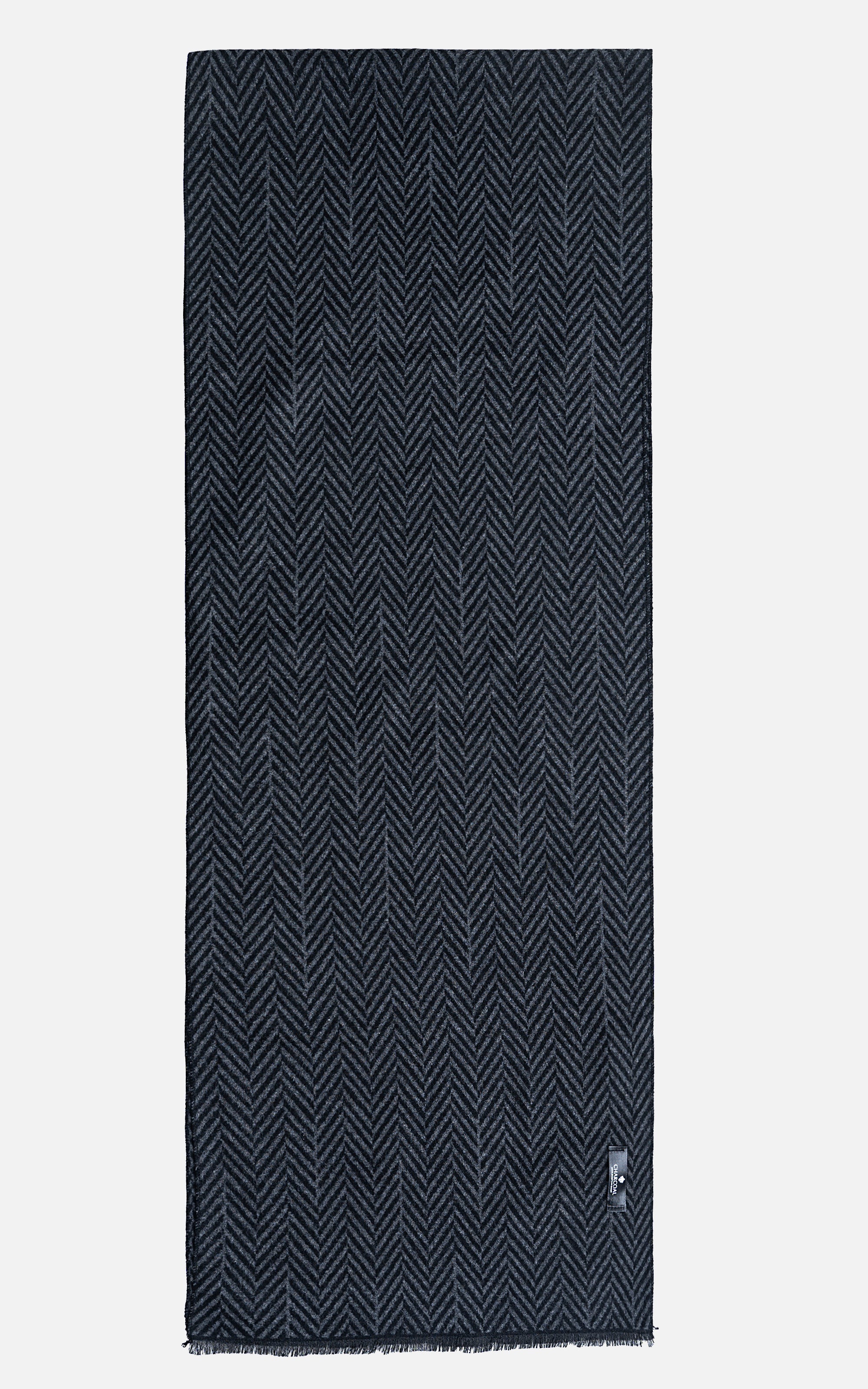 Dark herringbone scarf with frayed edges and small corner label