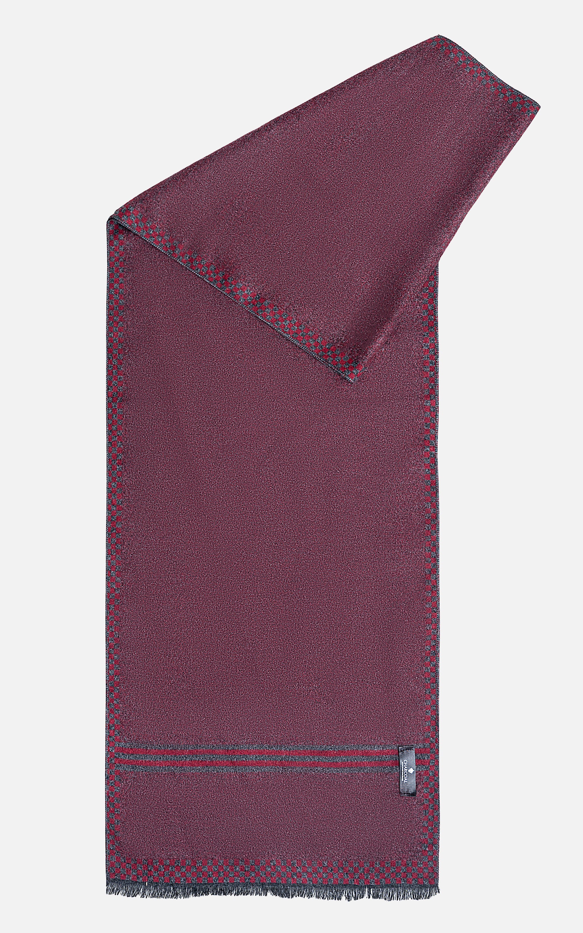 Burgundy scarf folded with diagonal corner, fringed edges, striped band and tag at bottom