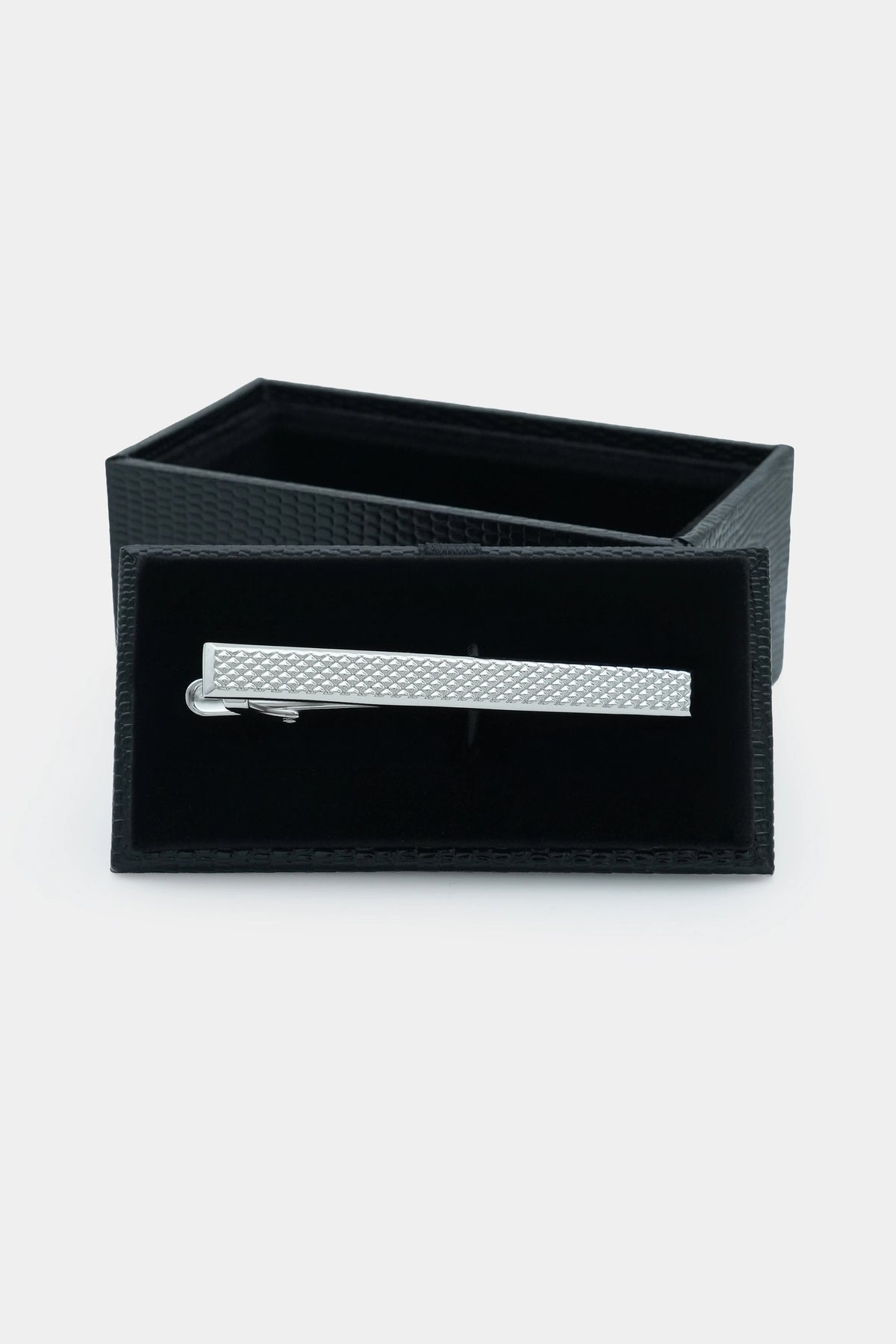 Silver textured tie pin in a black gift case