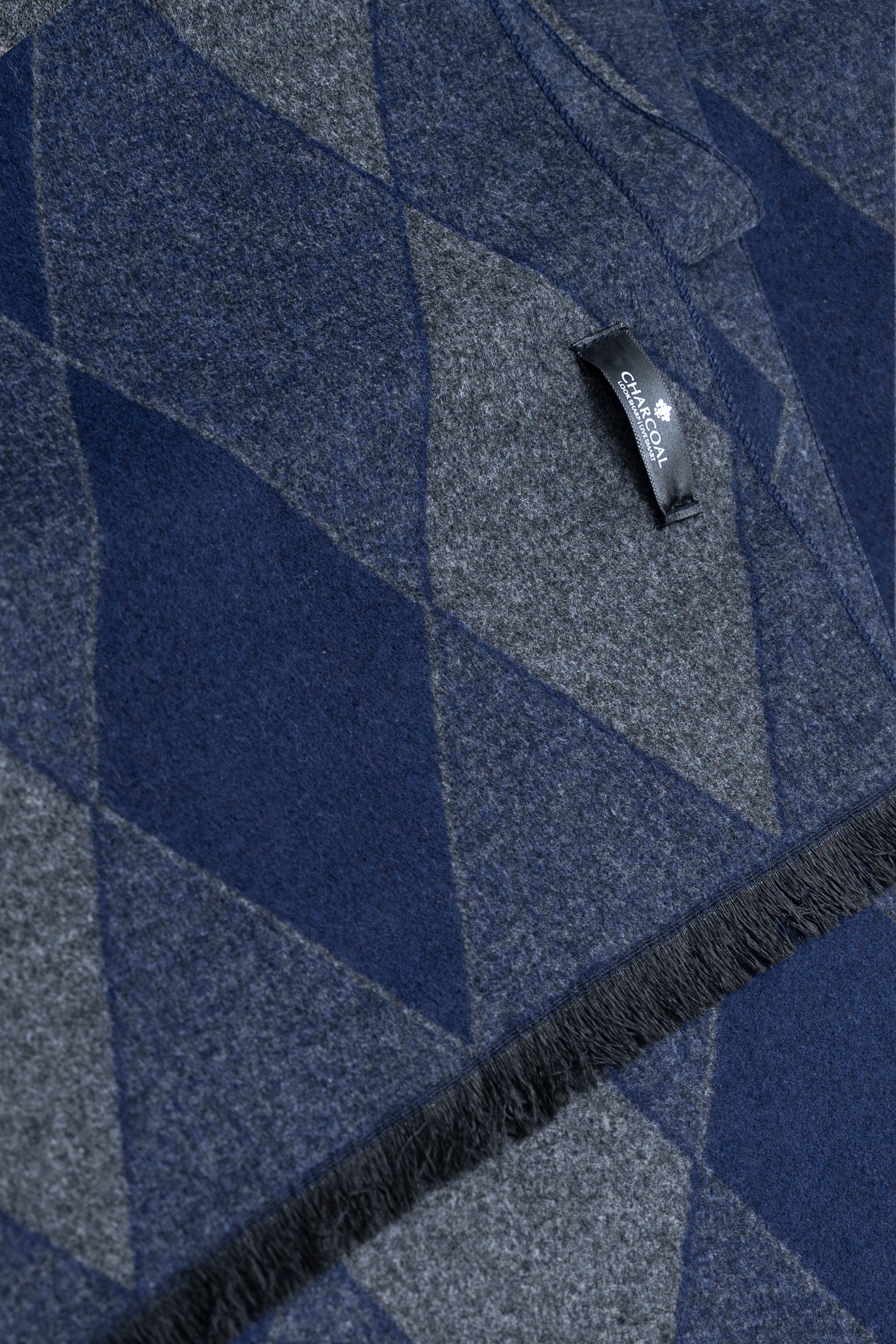 Navy and gray diamond knit scarf texture, stitched edge and logo tag