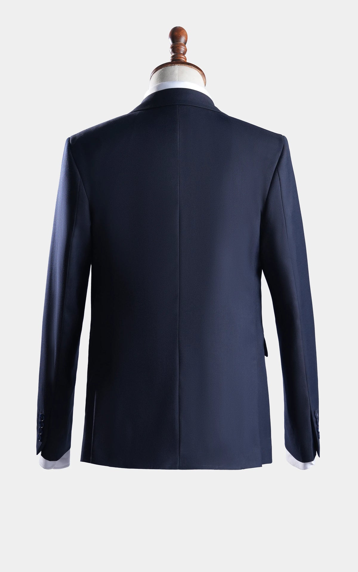 Back view of navy notch-lapel blazer on mannequin