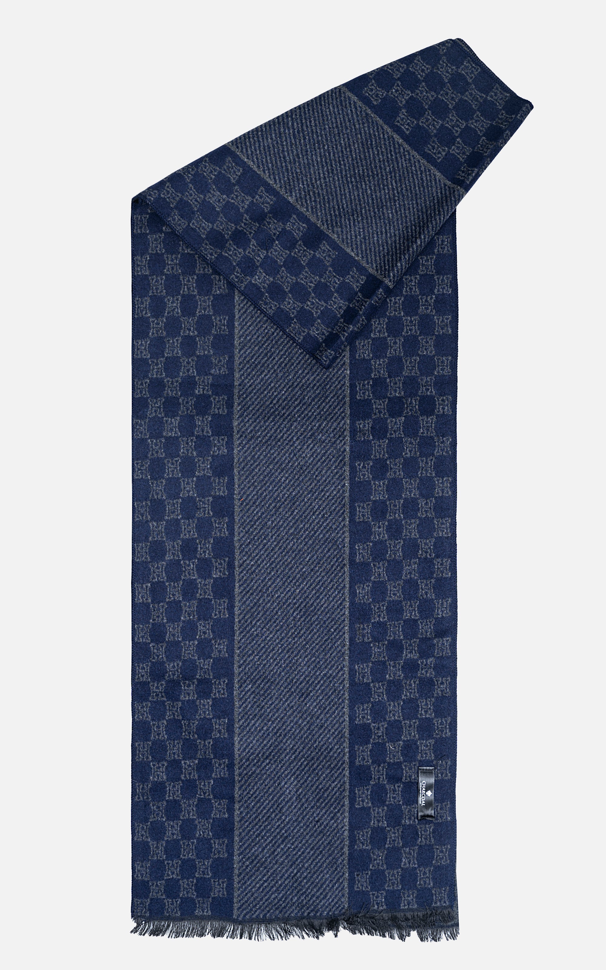 Blue patterned scarf with fringed ends and woven monogram-style texture