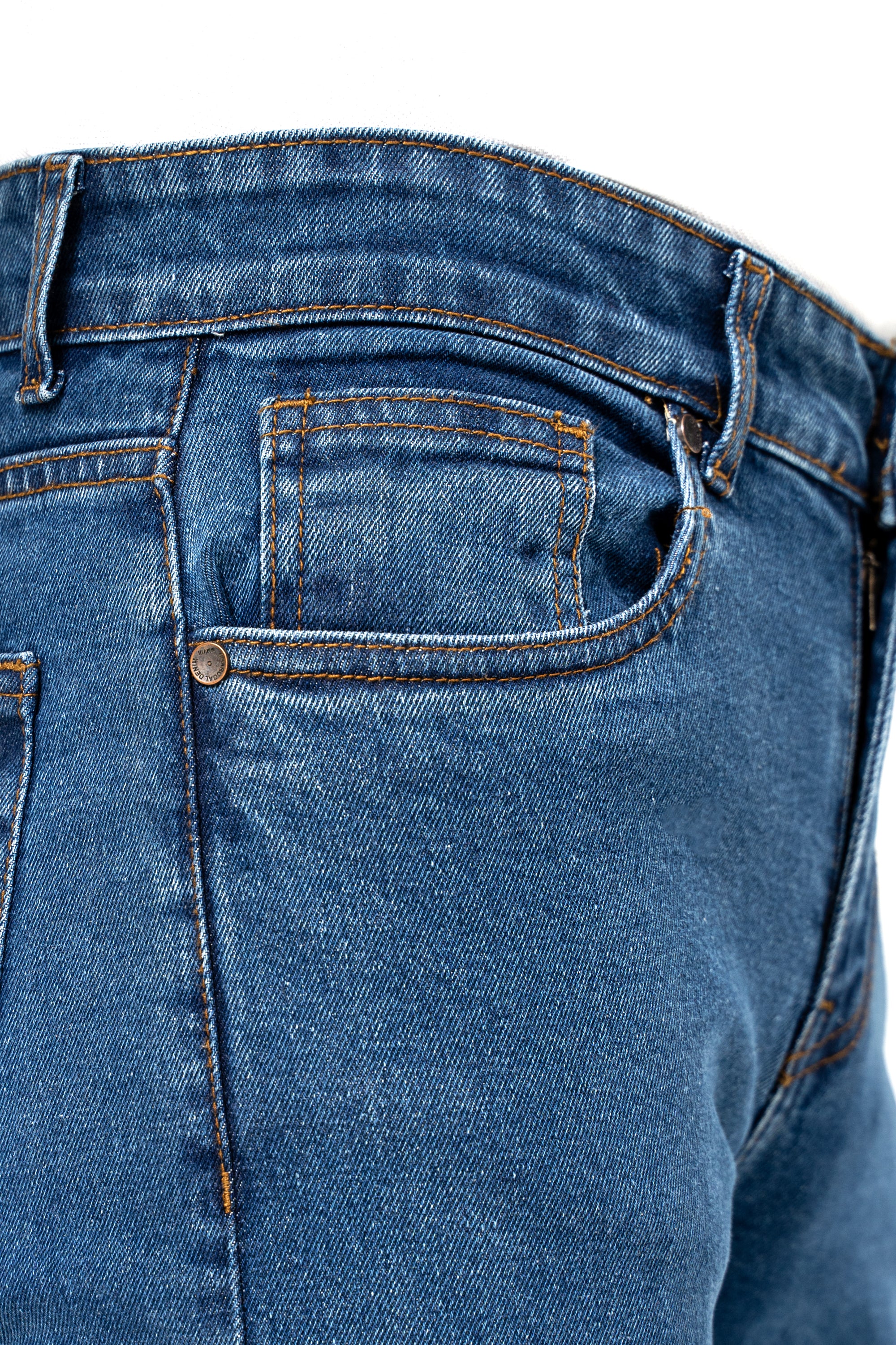 Mid blue denim jeans close-up: coin pocket, orange topstitching, and button closure