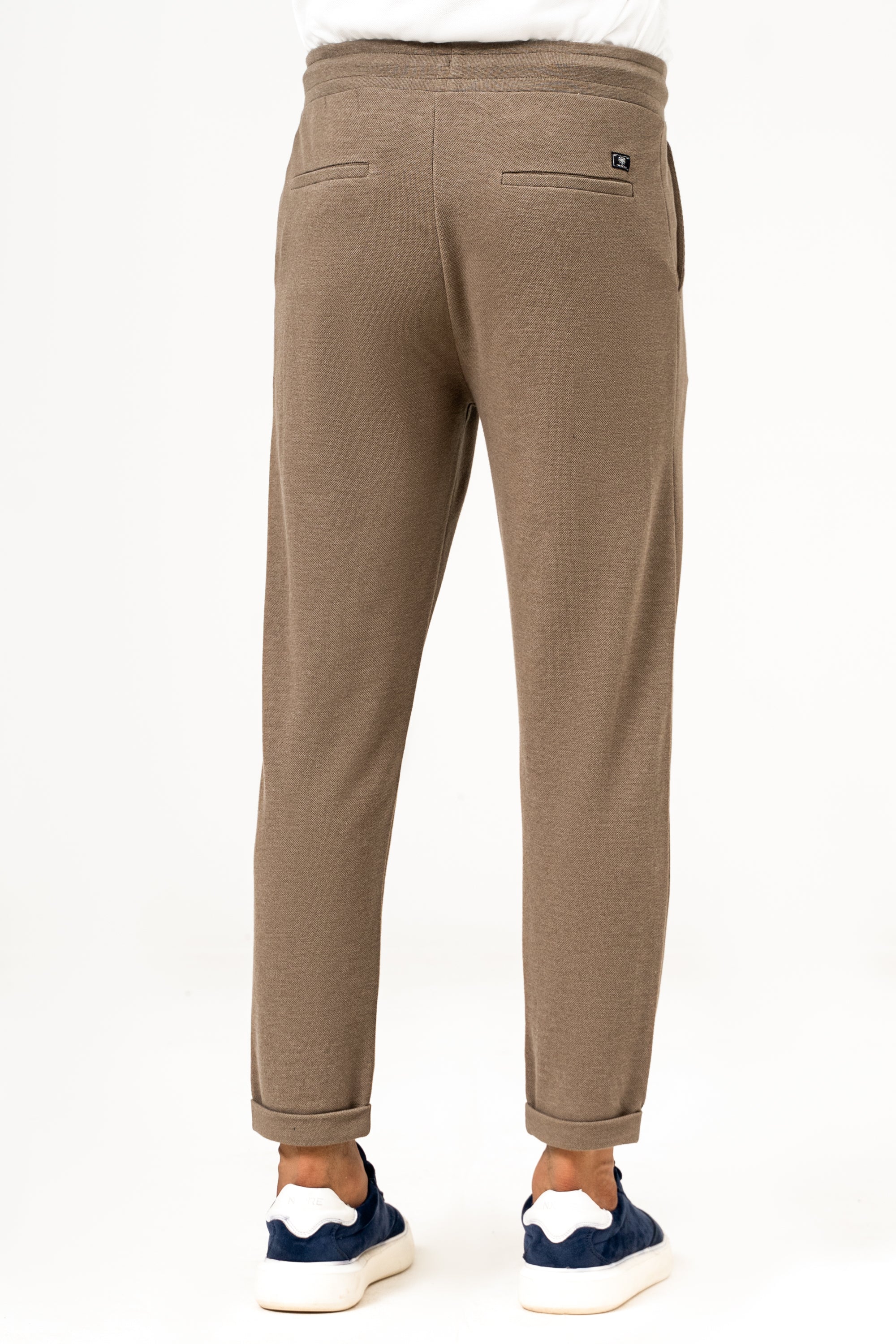 Khaki jogger waist trousers with rear patch pockets and tie drawcord