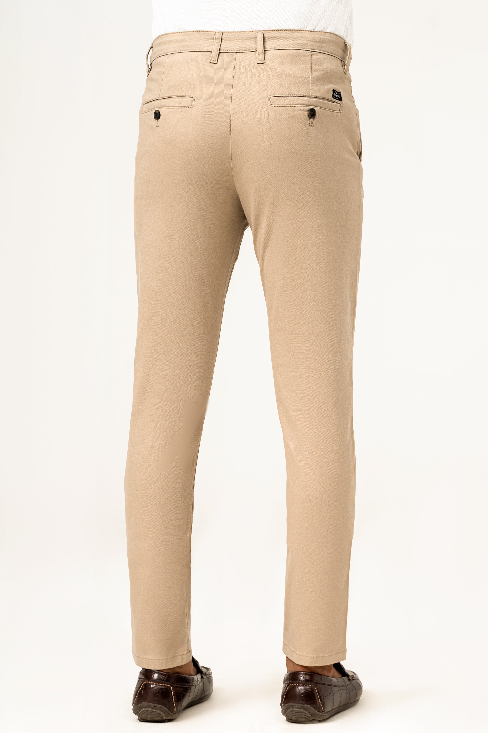 Beige casual pants from back view, belt loops and two rear button pockets