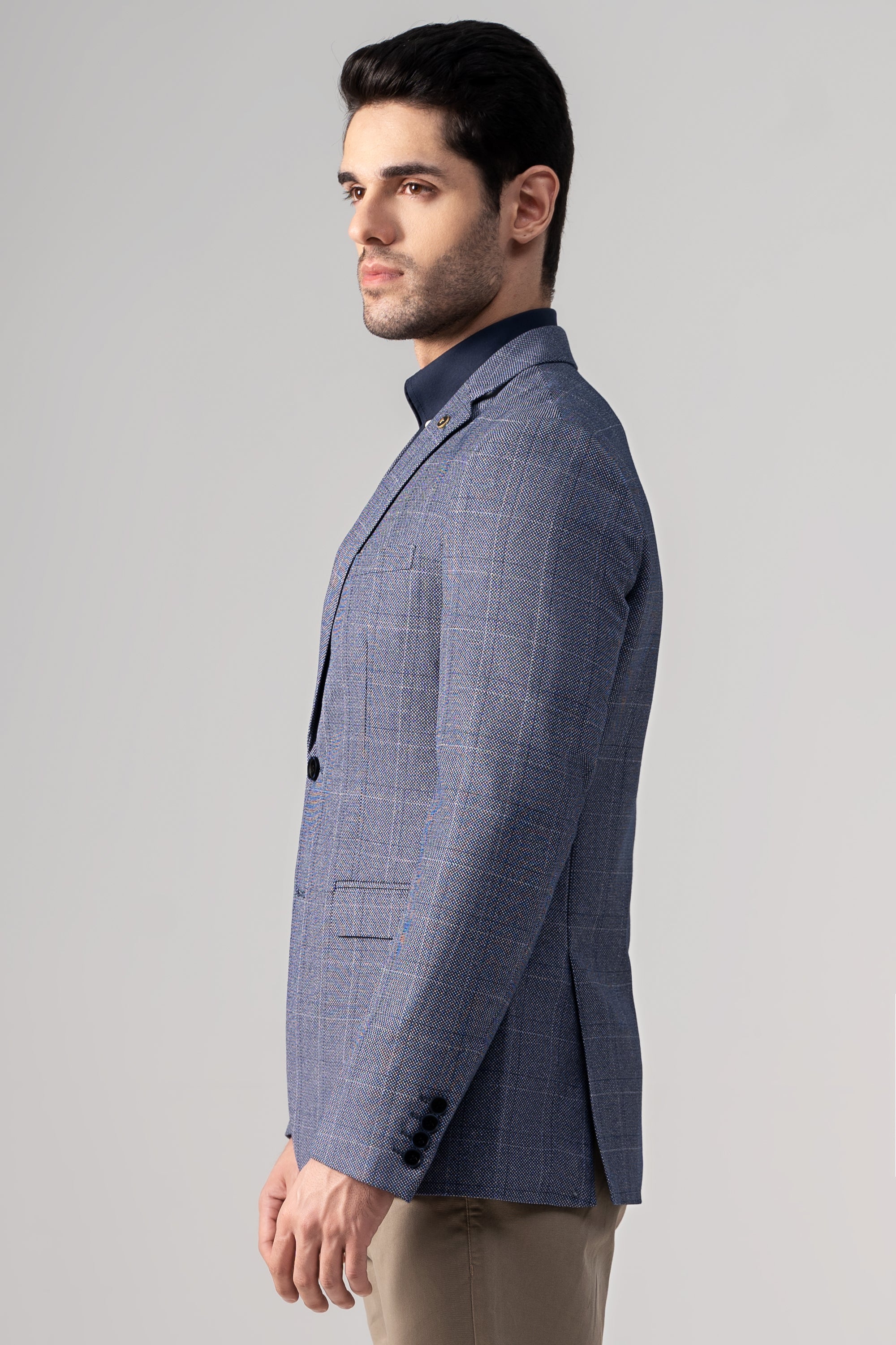 Men's blue casual coat, side view, notch lapels and single-breasted front