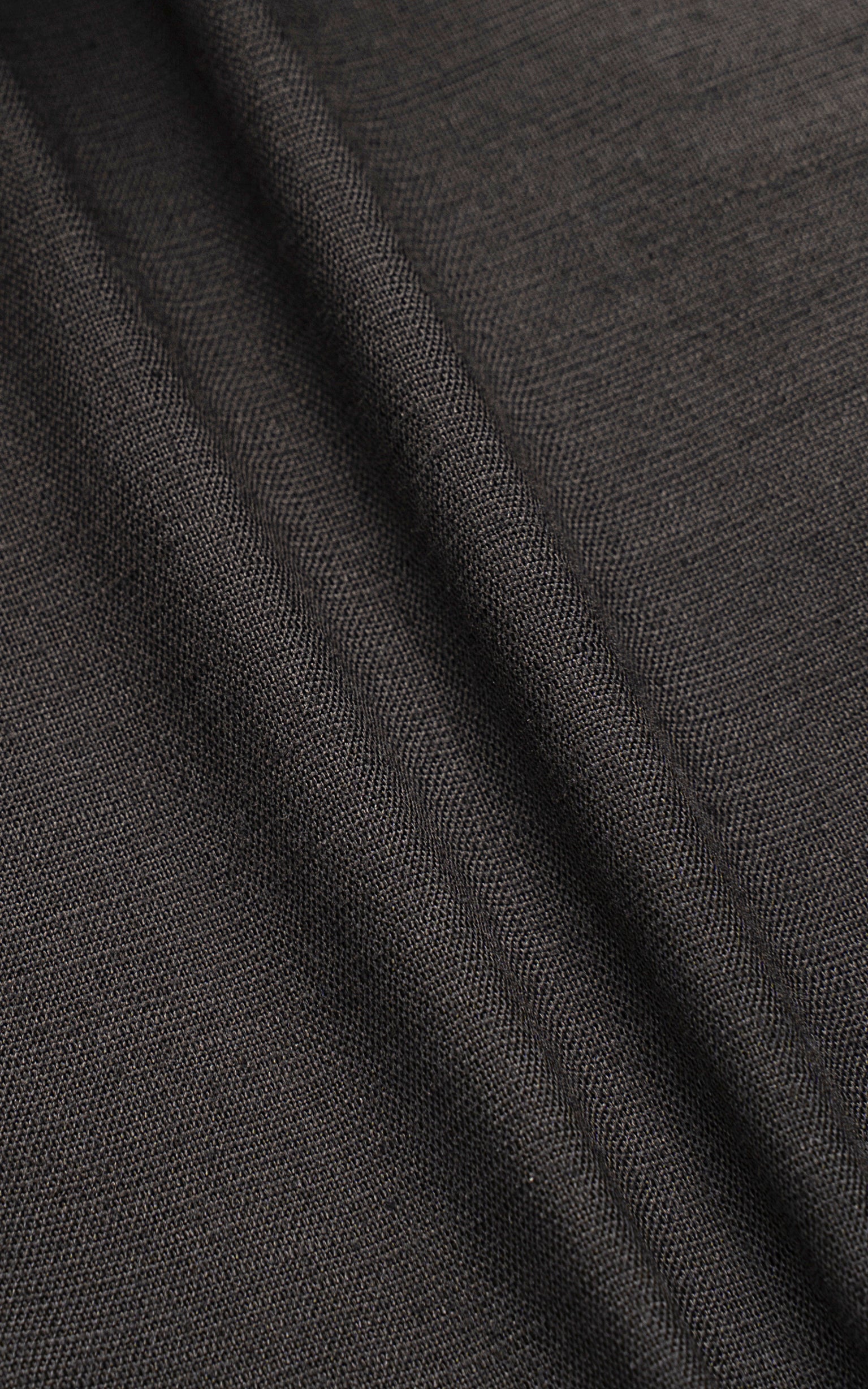 Dark gray woven shirt fabric with subtle textured weave