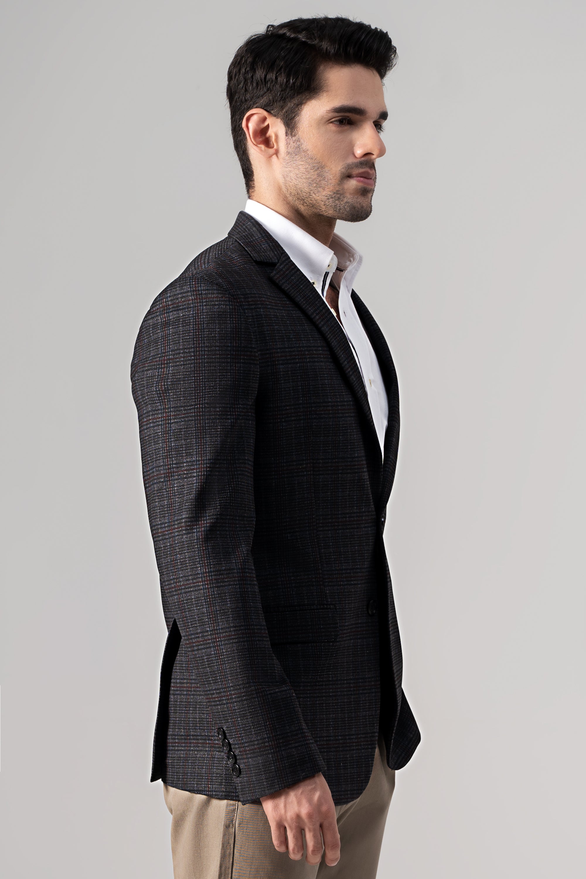 Grey check casual coat with notch lapels and front buttons, welt pockets.