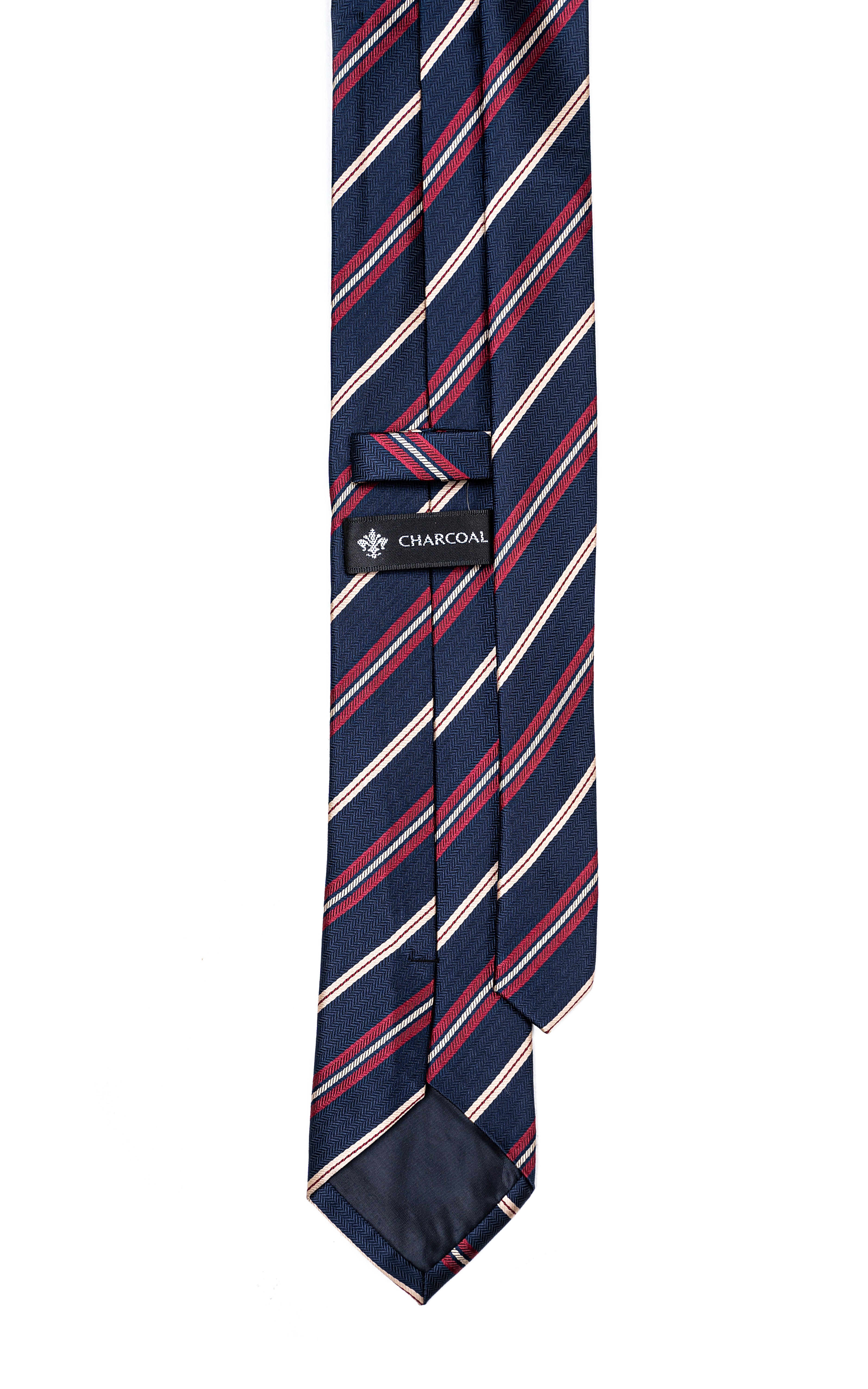 Navy poly silk tie with diagonal stripes and charcoal label at keeper