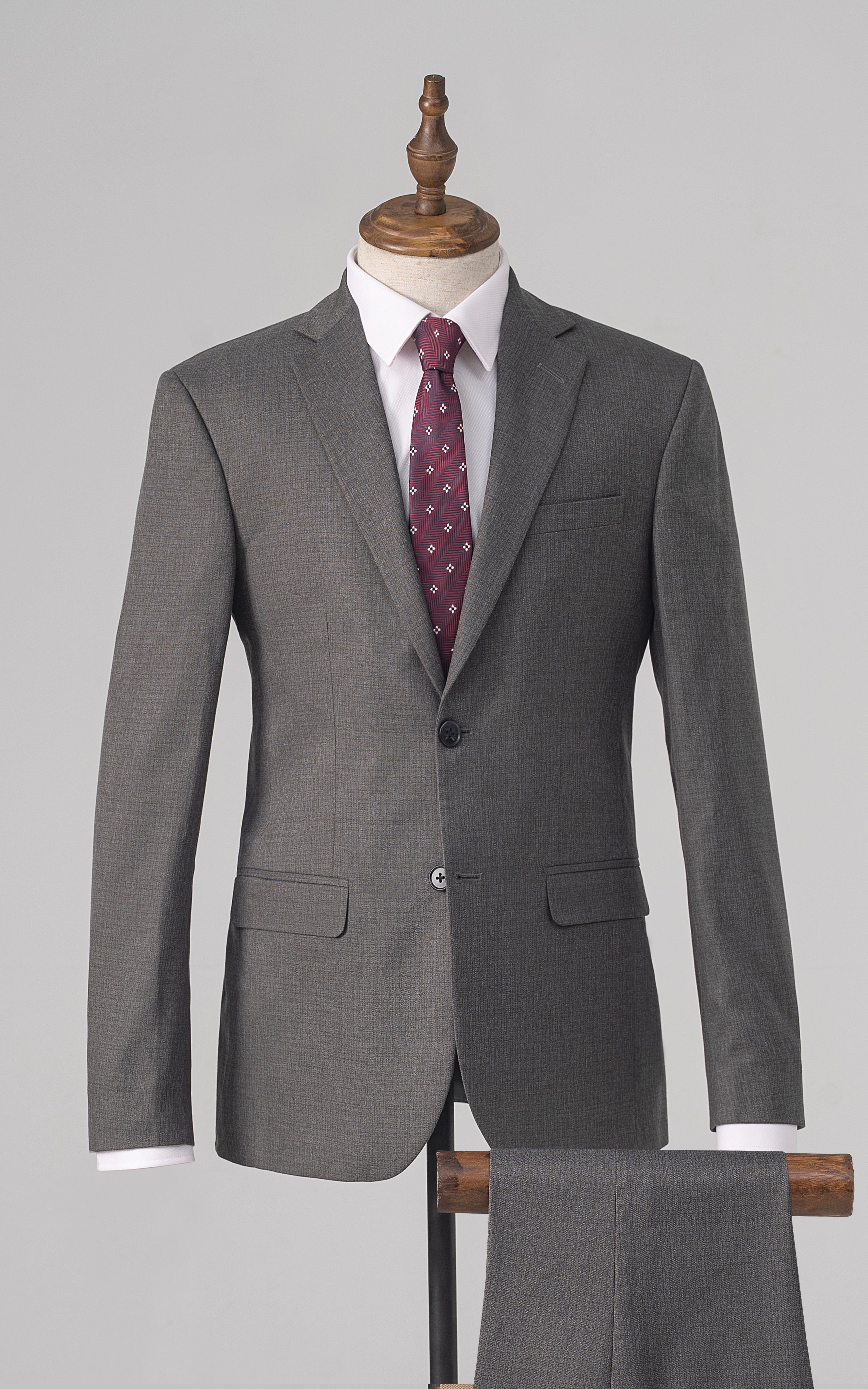 Grey 3-piece suit with vest, jacket and waistcoat on mannequin