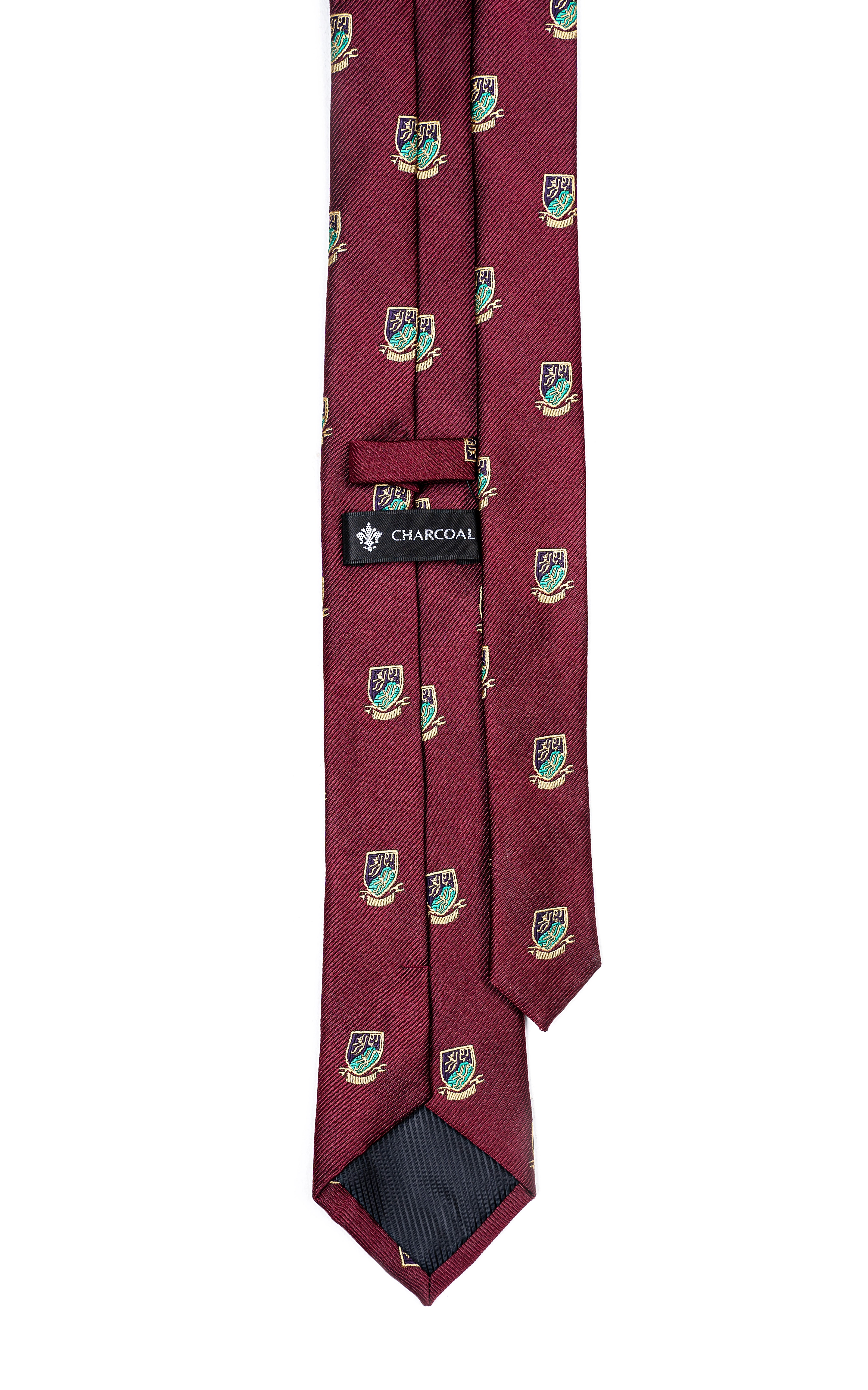 Poly silk tie in maroon with repeating green crest motifs and tie clip at center