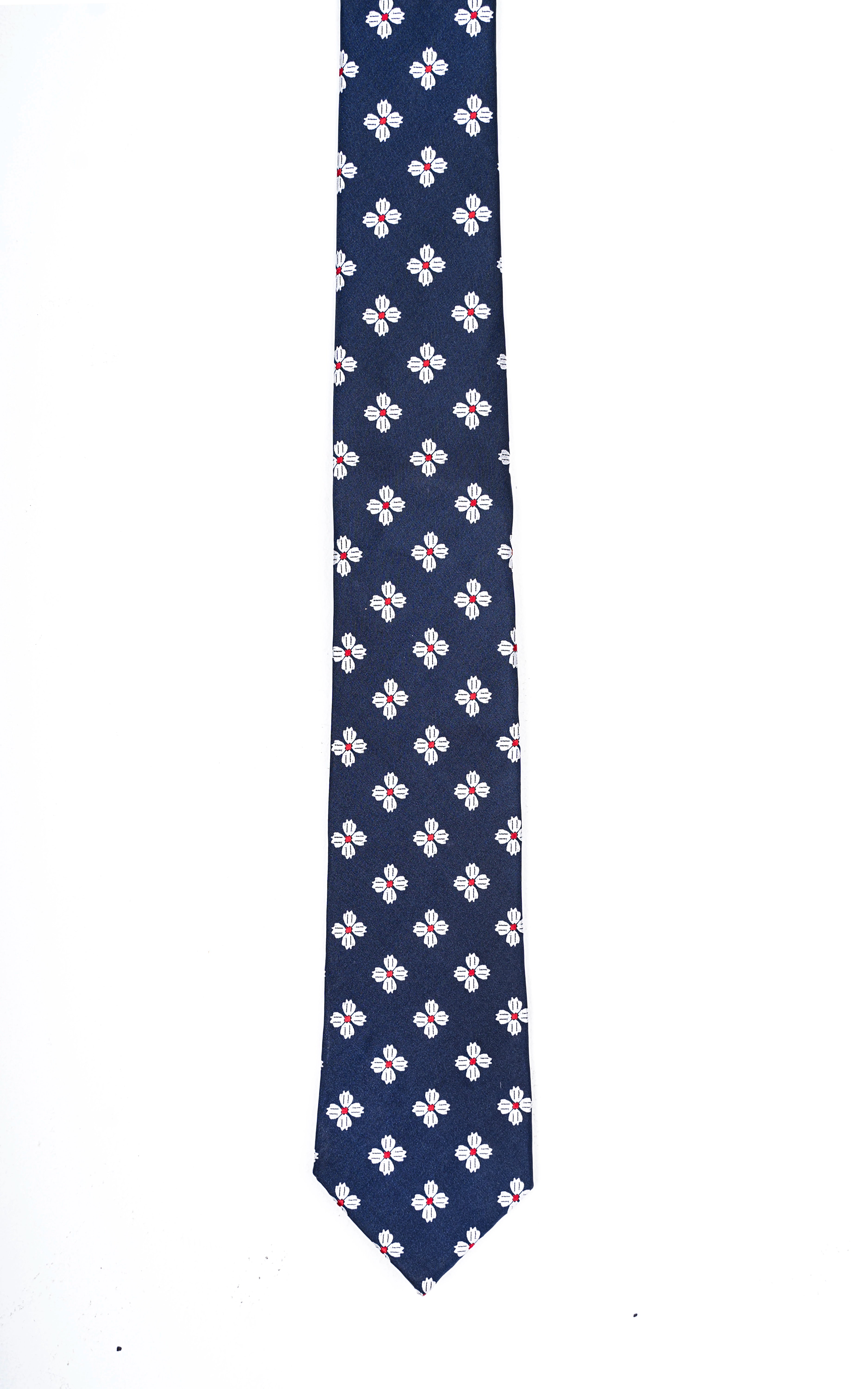 Navy poly silk tie with small white and pink flower pattern, full length
