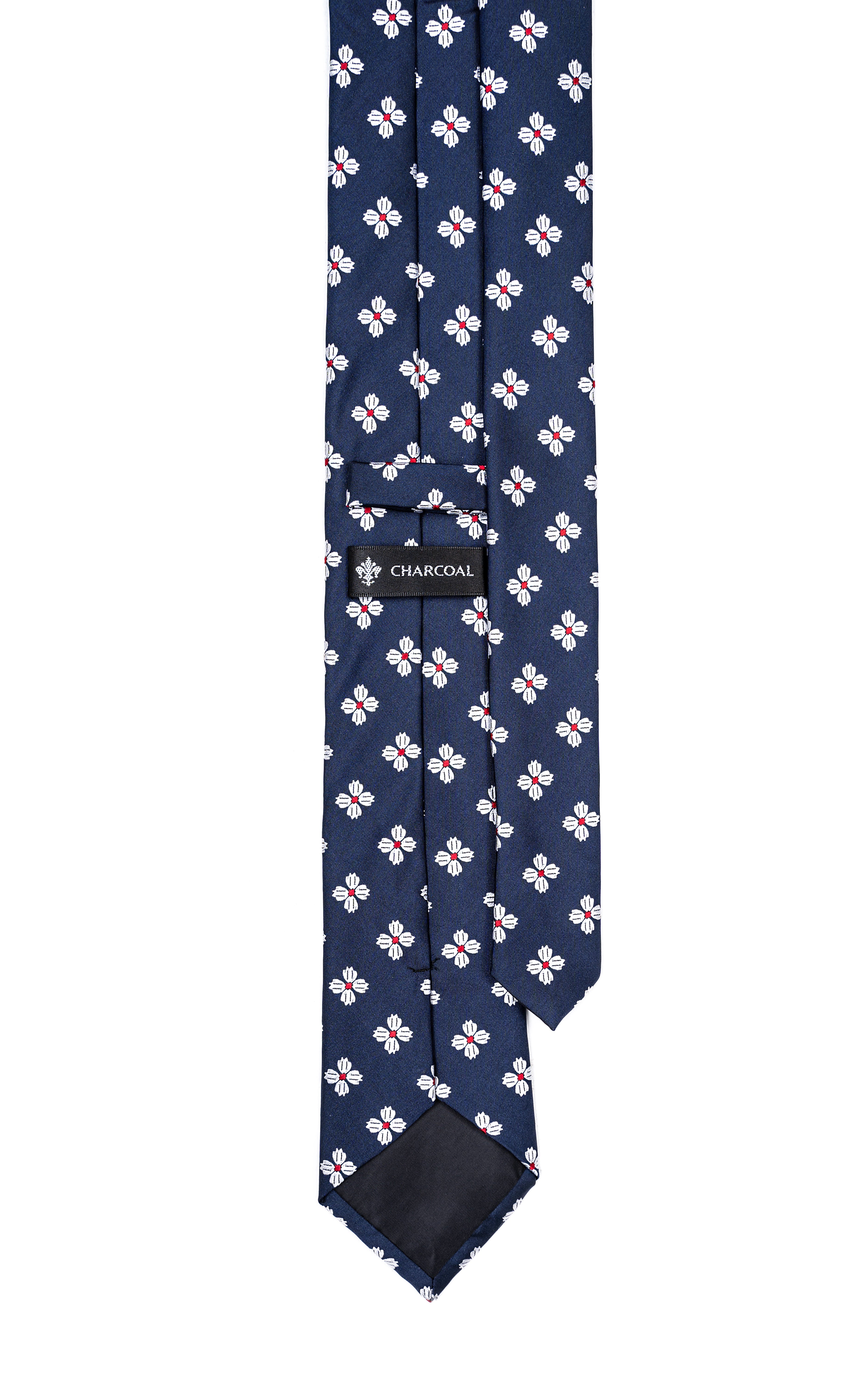 Navy poly silk tie with white and pink floral pattern and small logo label