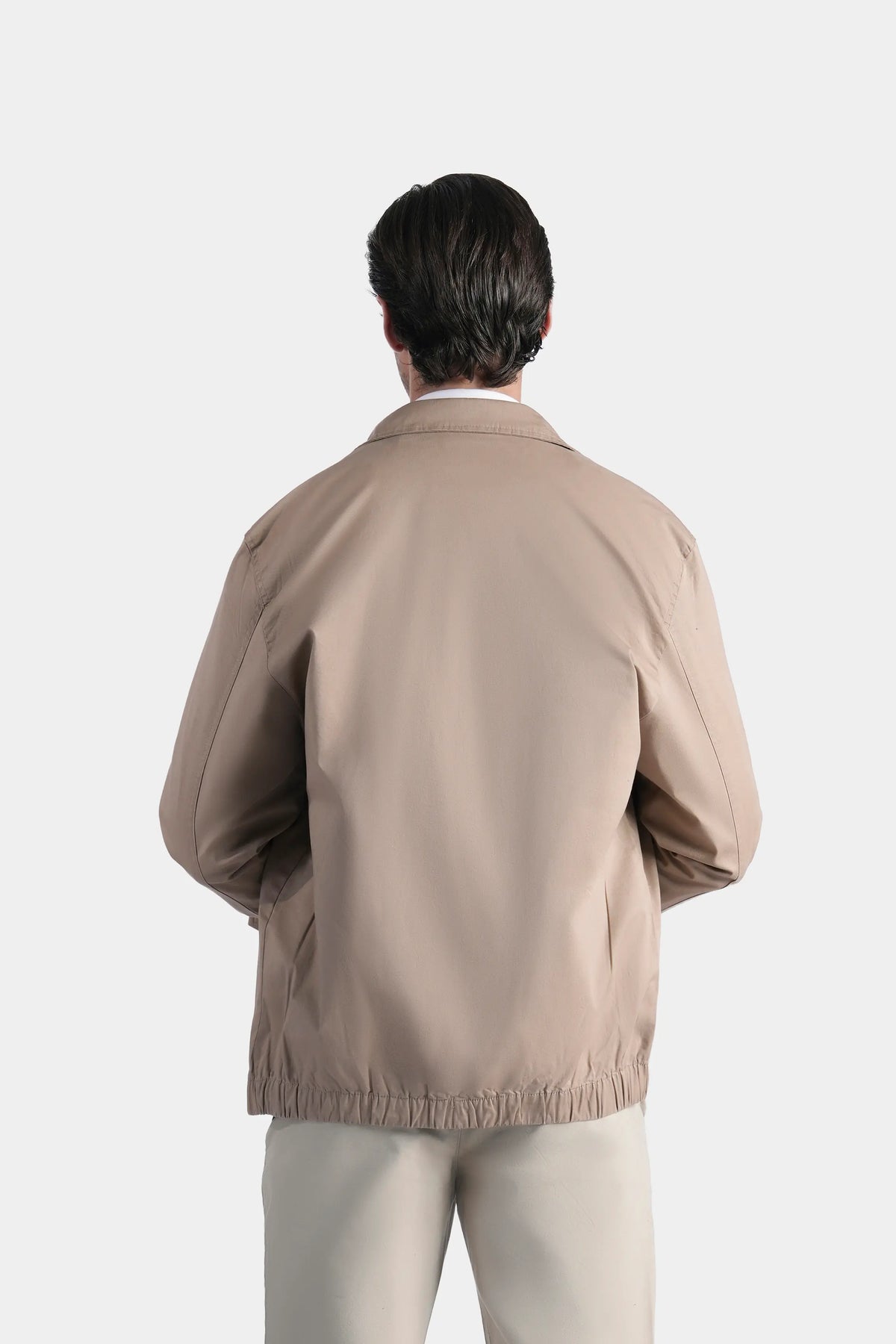 Khaki relaxed-fit jacket, back view, stand collar and gathered hem
