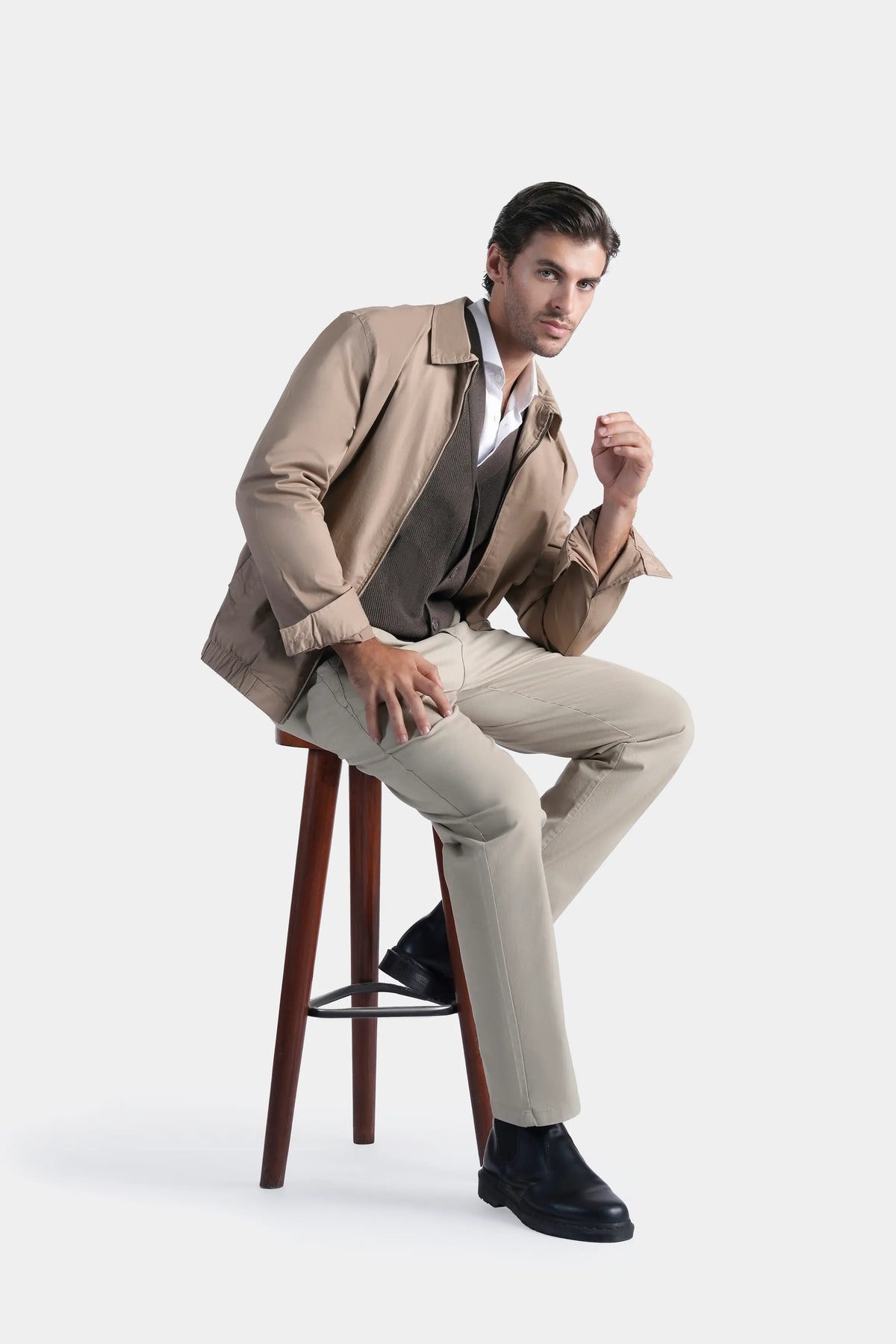 Khaki relaxed-fit jacket, angled view, stand collar with snap-front closure