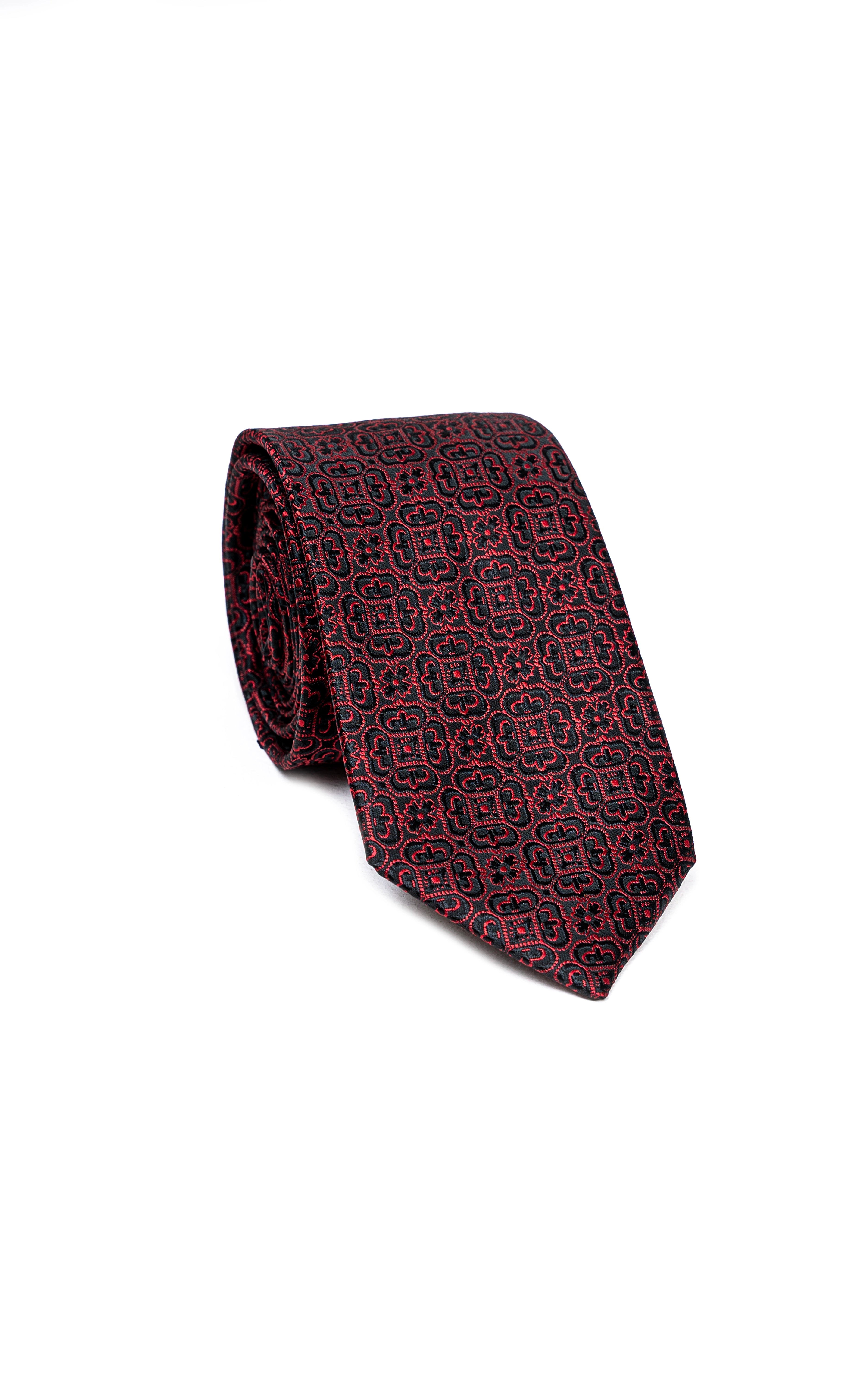 Burgundy poly silk tie with repeating small geometric motif, folded near knot