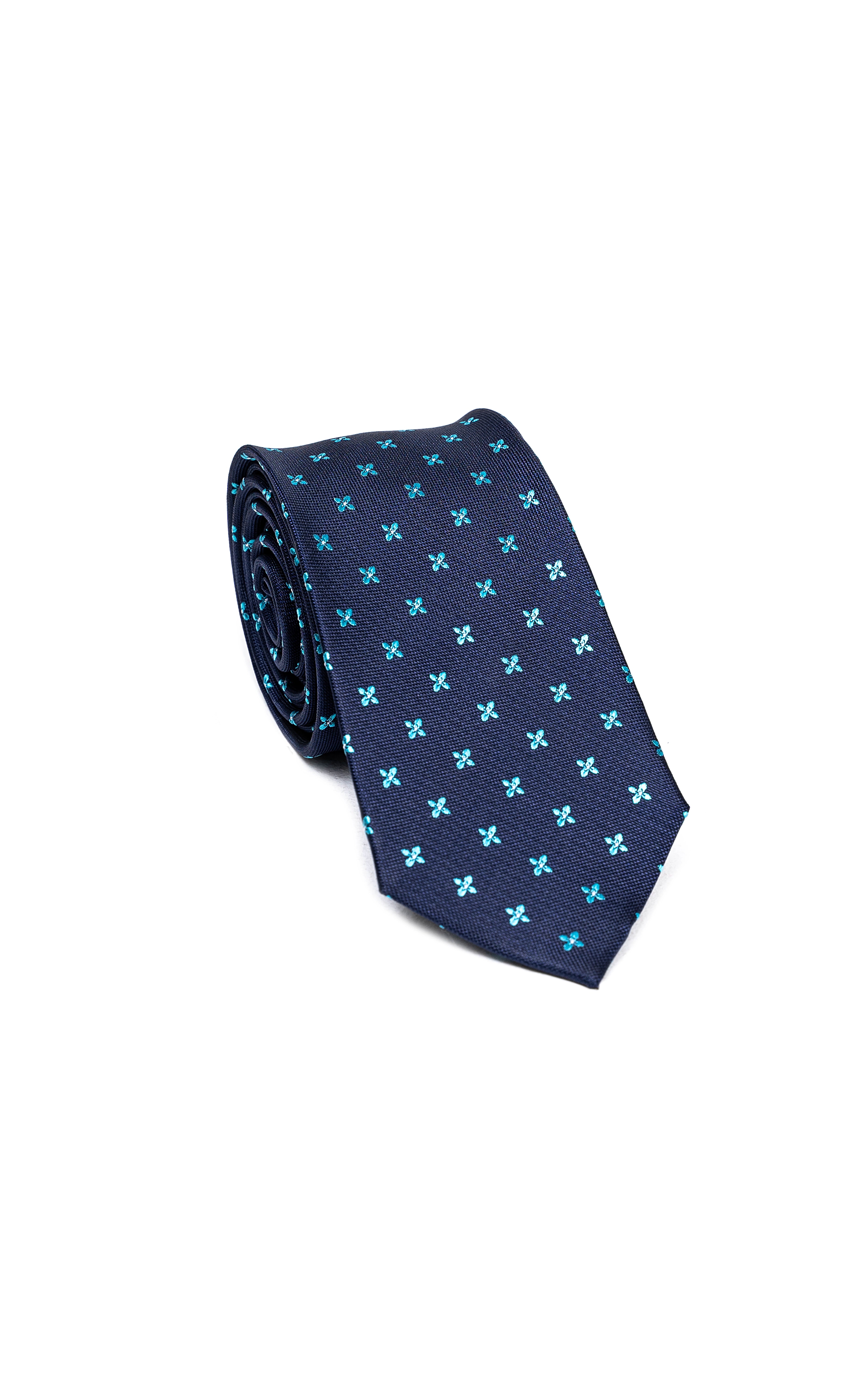 Blue polyester tie with teal clover pattern, folded view with pointed tip.