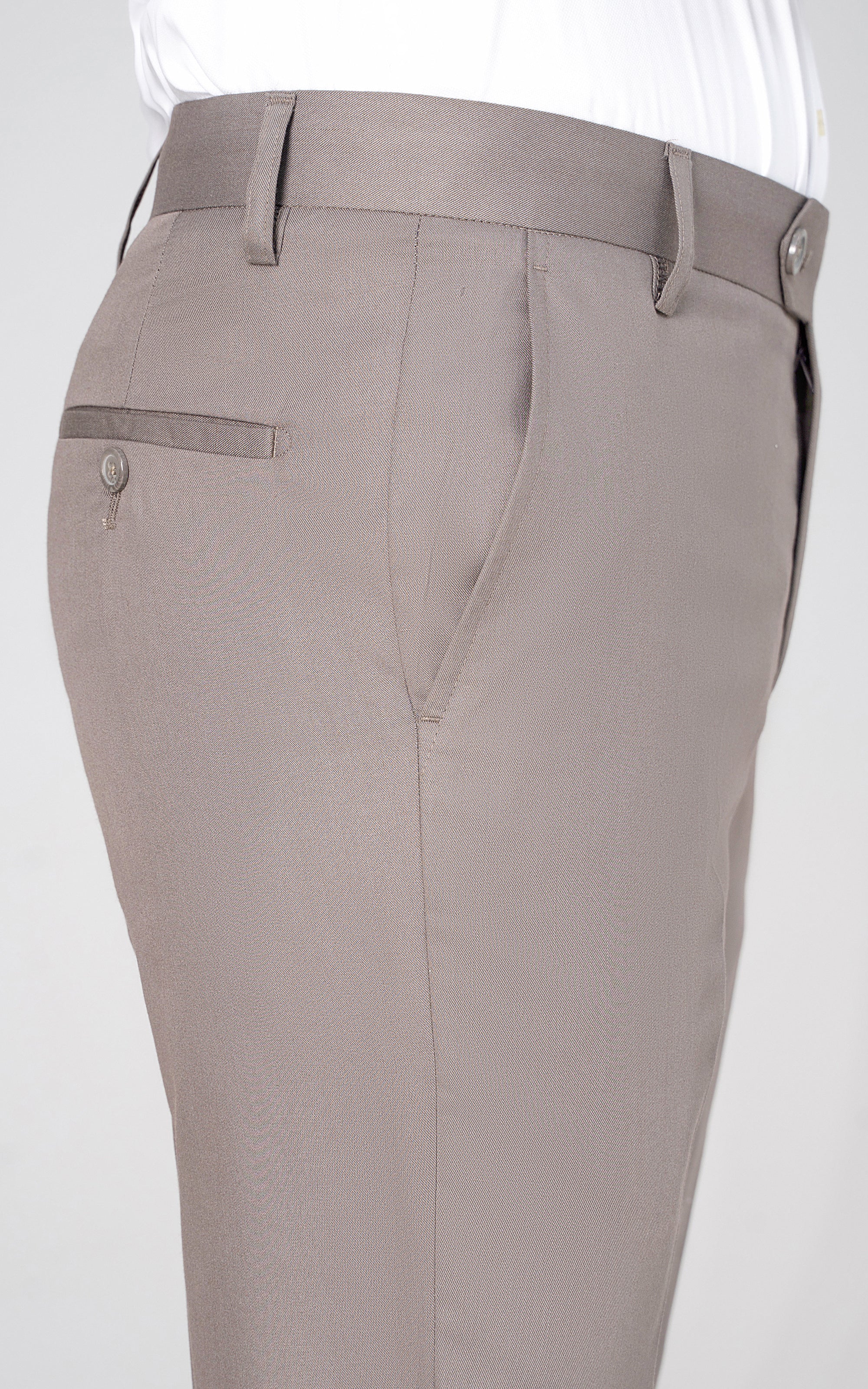 Mud grey dress pants waistband with belt loops, zip fly, and button closure