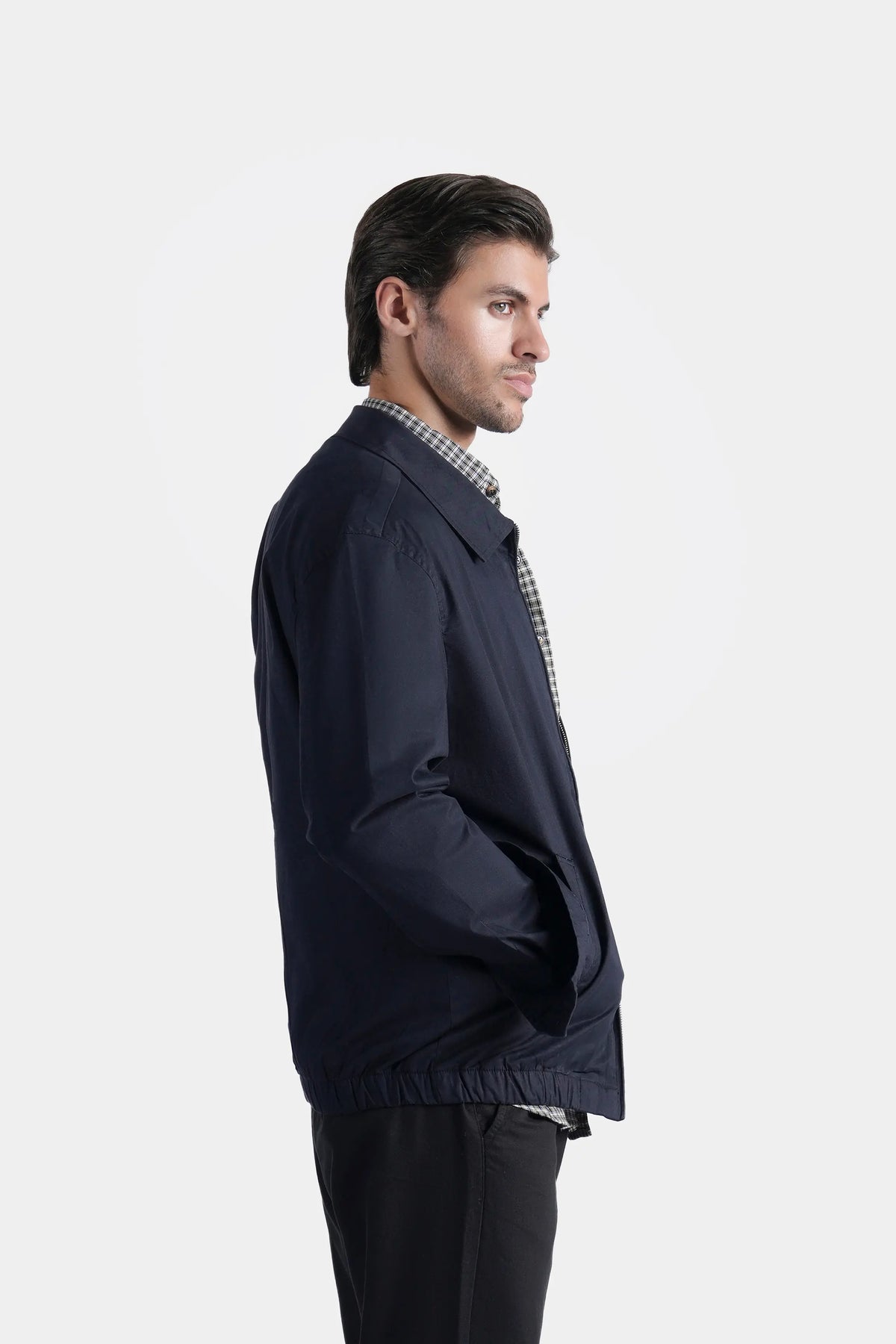 Dark navy relaxed-fit full-sleeve jacket, side profile with open front and collar