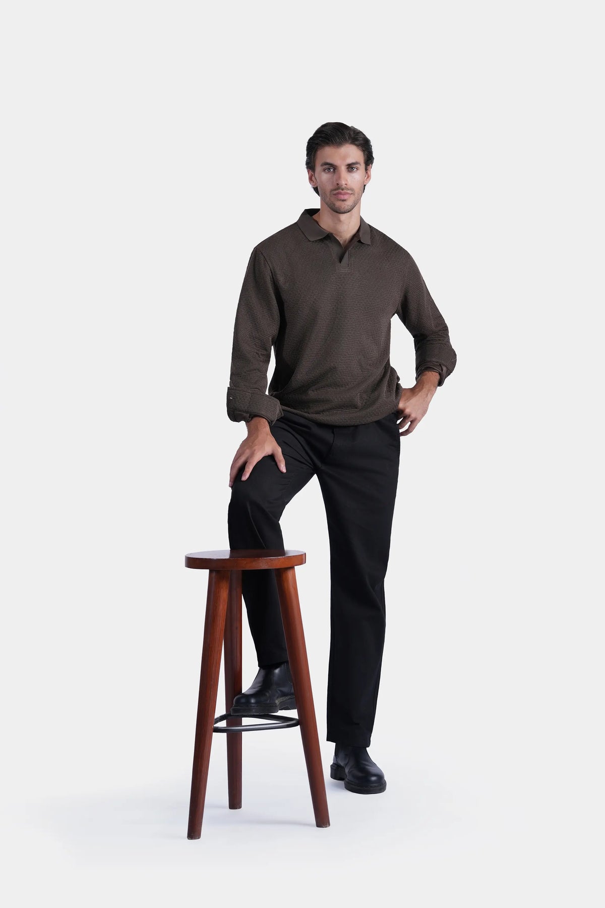 Long-sleeve self-textured polo shirt, dark brown, front view with cuffs