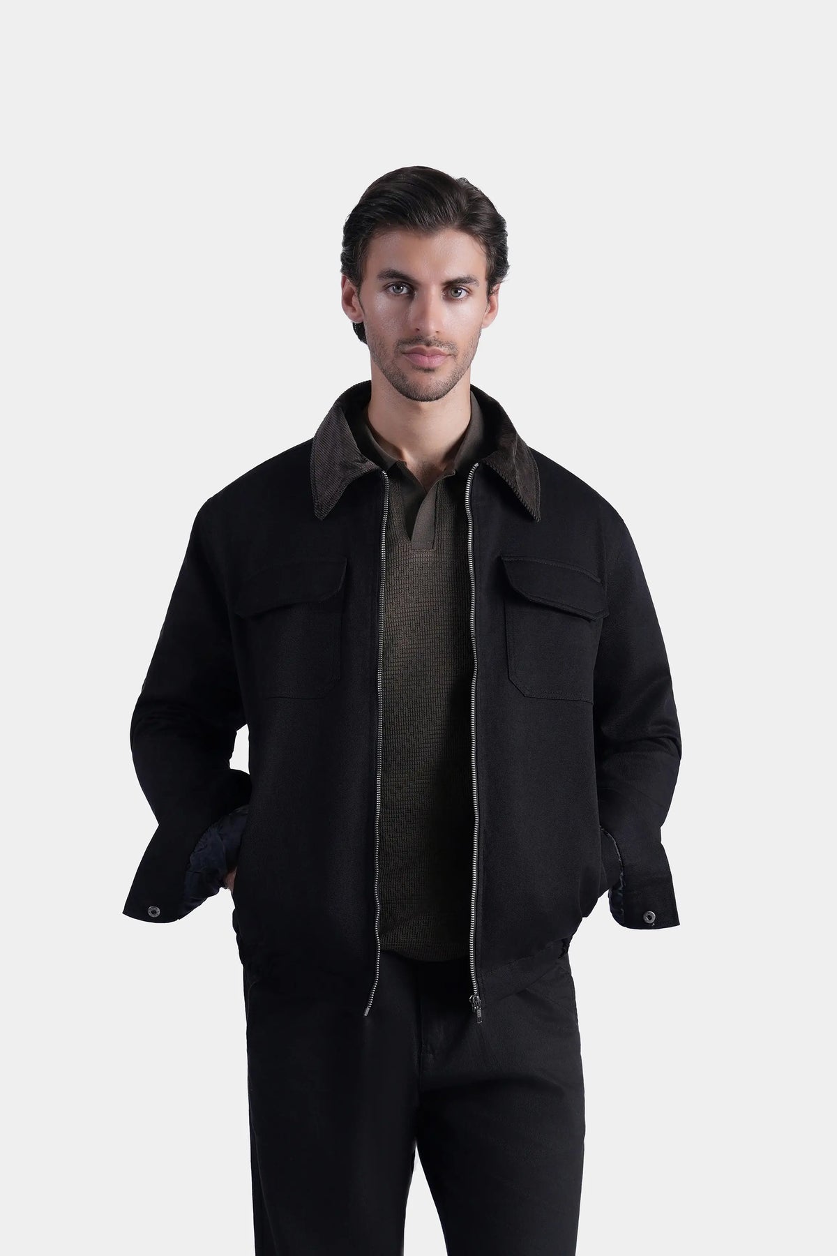 Black full-sleeve relaxed-fit jacket with collared neckline and flap pockets