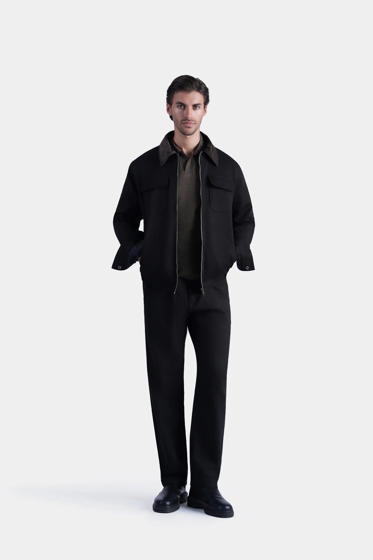 Men's black relaxed-fit long-sleeve jacket with shirt collar and flap chest pockets