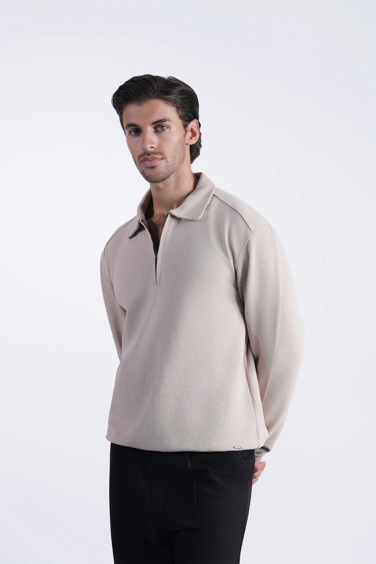 Beige long-sleeve polo shirt with full zipper and ribbed collar