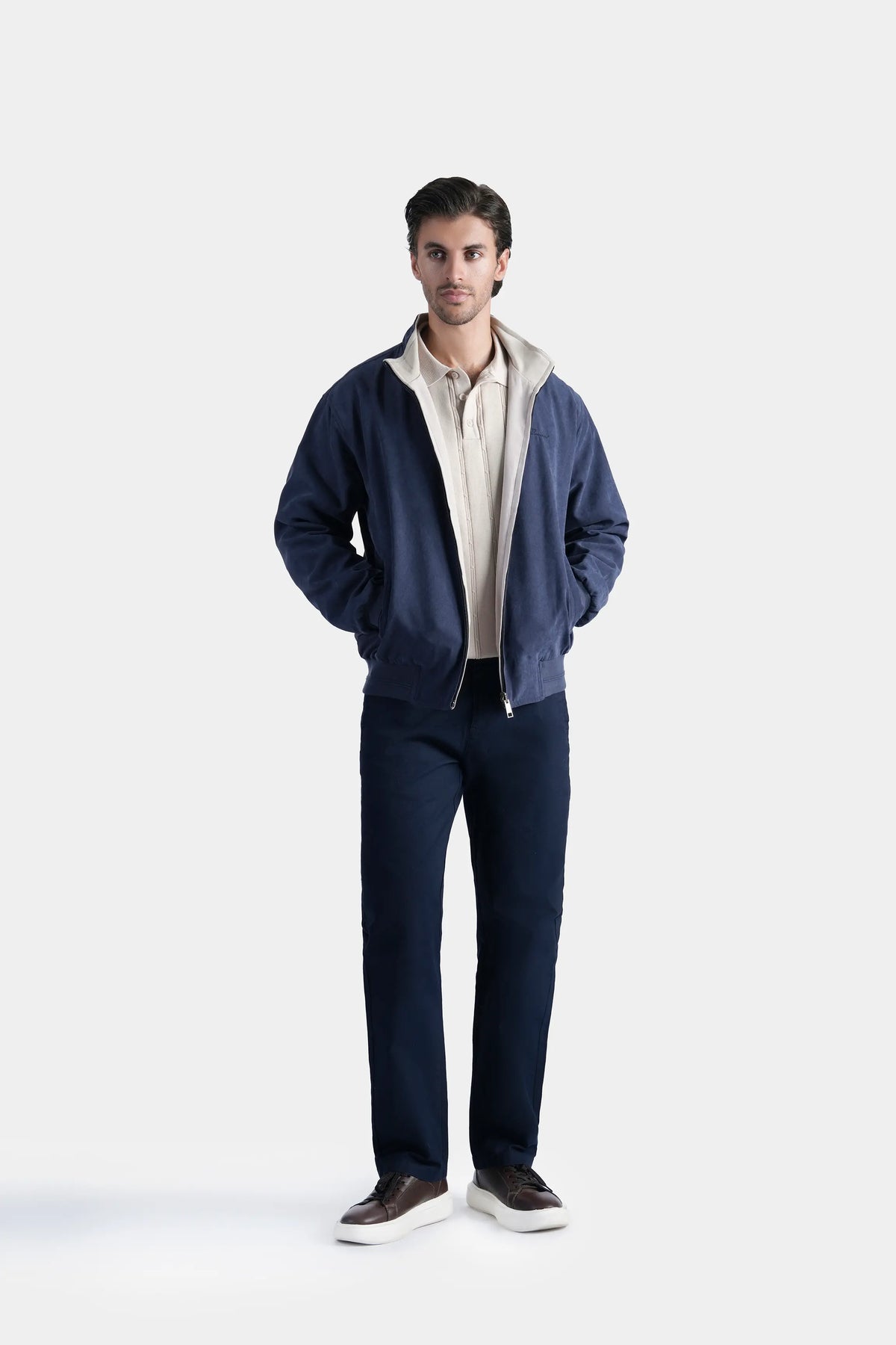 Reversible full-sleeve jacket in dark blue with beige lining, front zip, stand collar