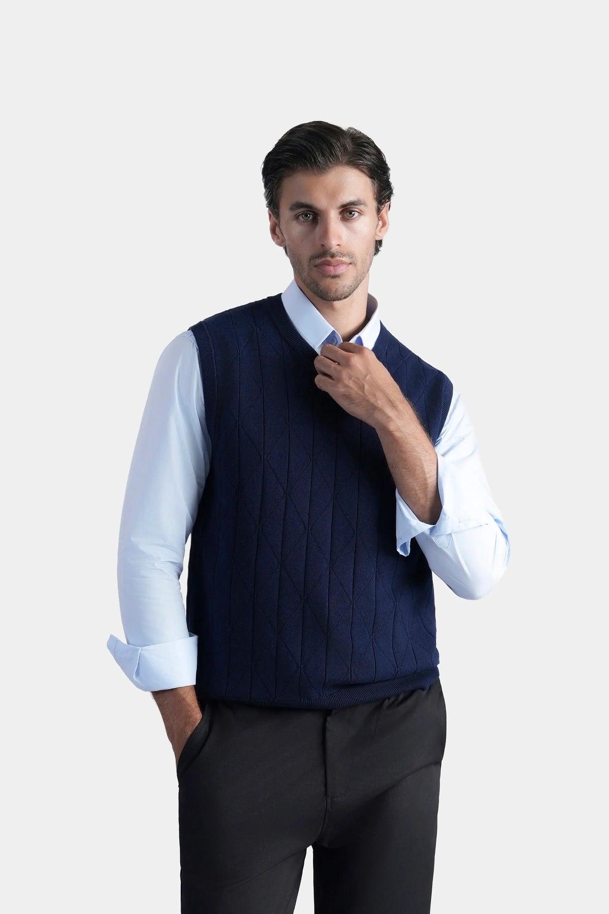 Navy V-neck sleeveless knit sweater with textured front knit pattern