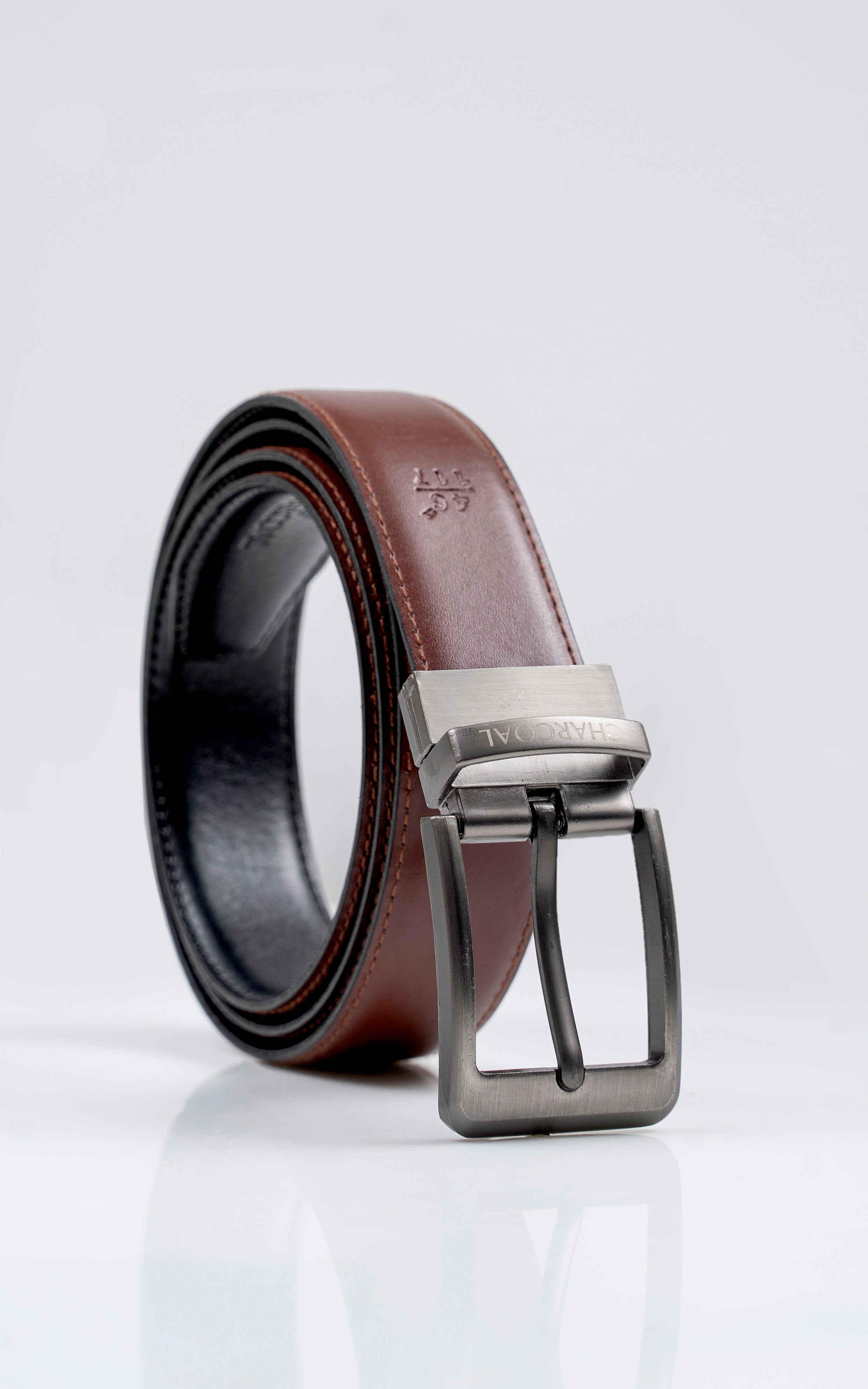 Reversible leather belt with silver-tone rectangular buckle, brown and black sides