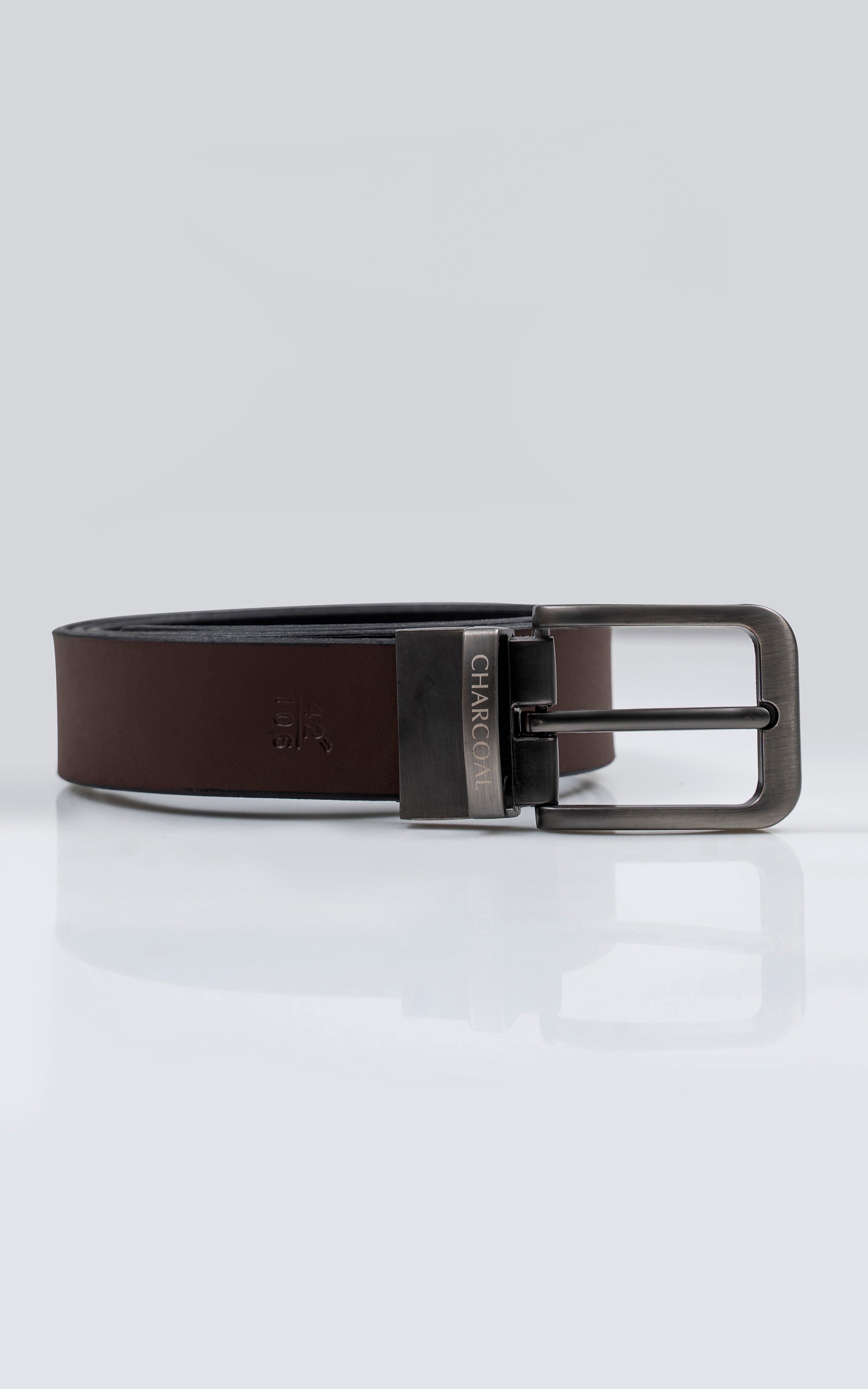 Reversible belt with dark brown strap and silver rectangular buckle