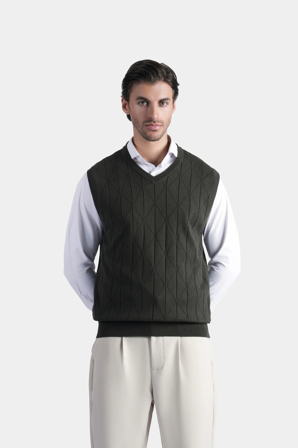 Sleeveless knit V-neck sweater vest in dark color, diamond pattern front
