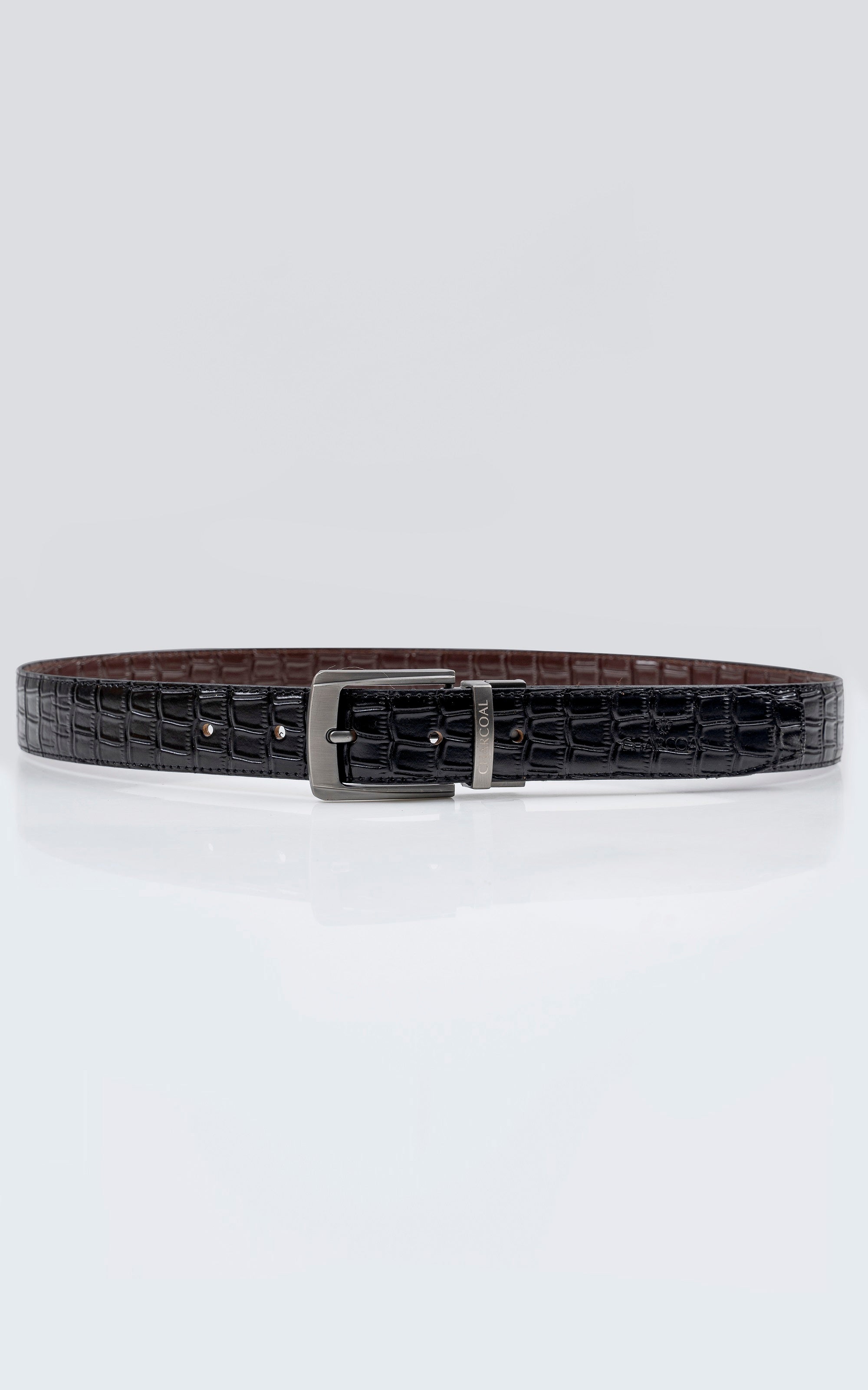 Reversible leather belt with dark finish and square metal buckle, crocodile texture.