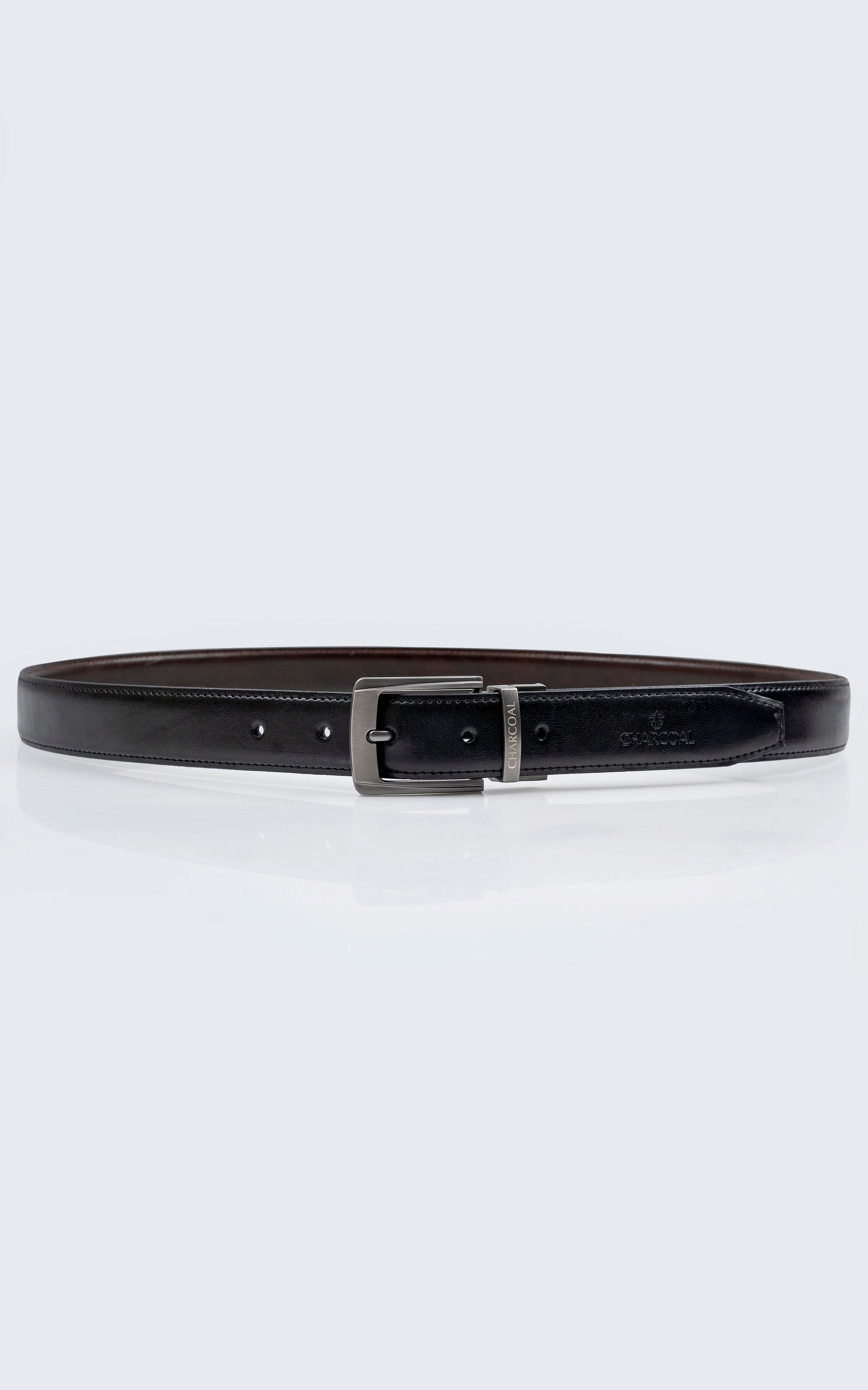 Dark leather belt with rectangular metal buckle and belt keeper holes