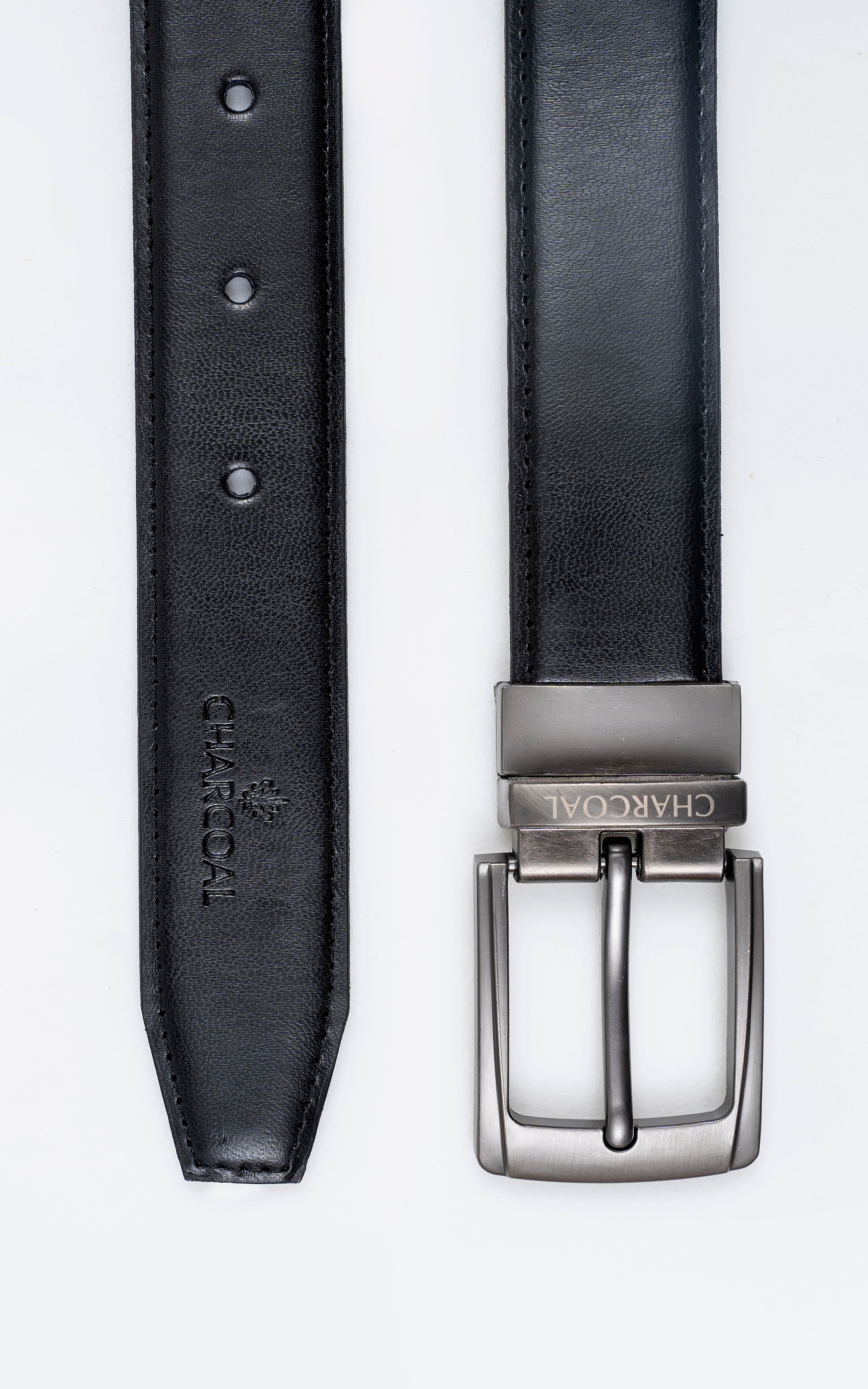 Dark leather belt strap with keeper holes and silver rectangular buckle