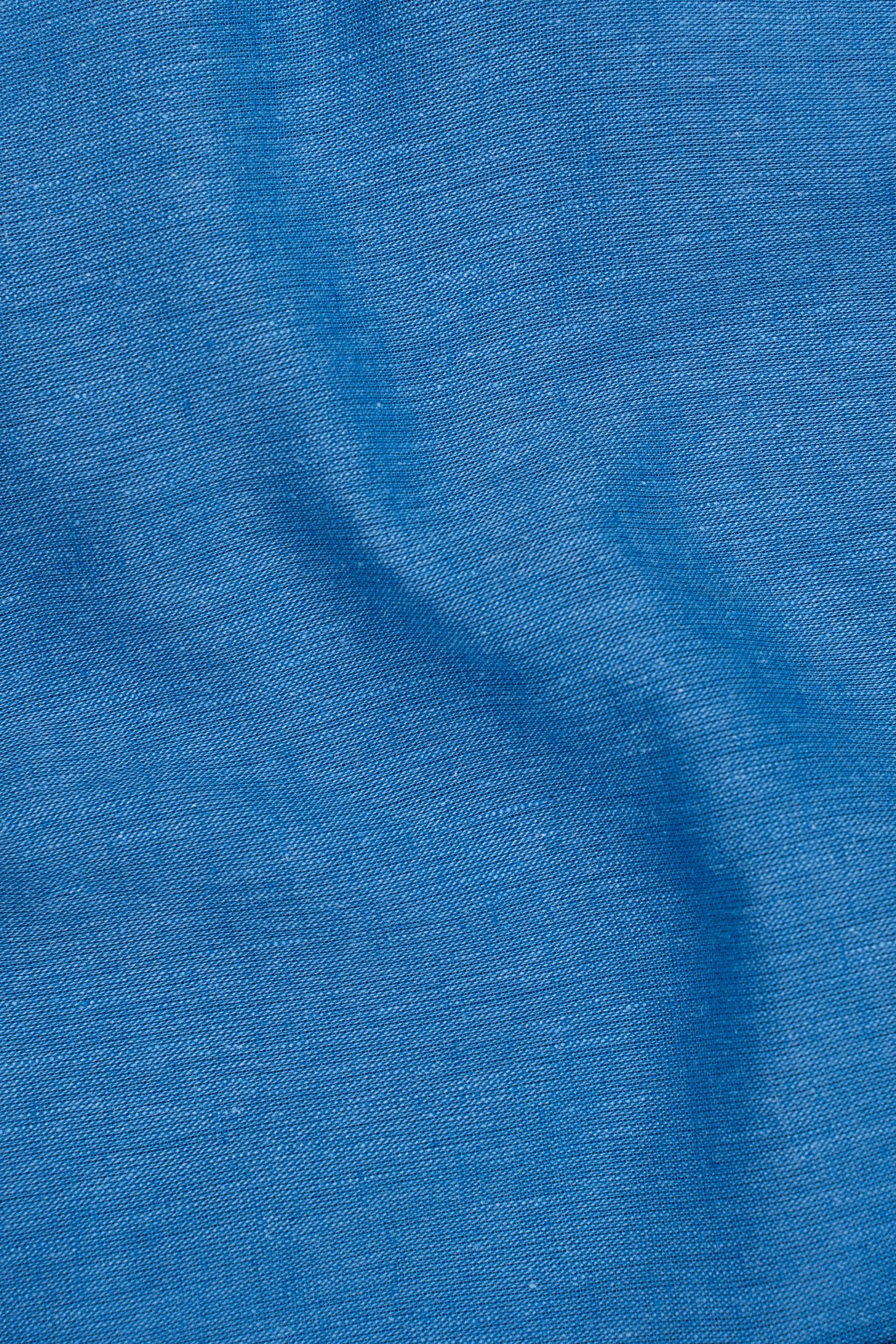 Blue linen fabric texture close-up