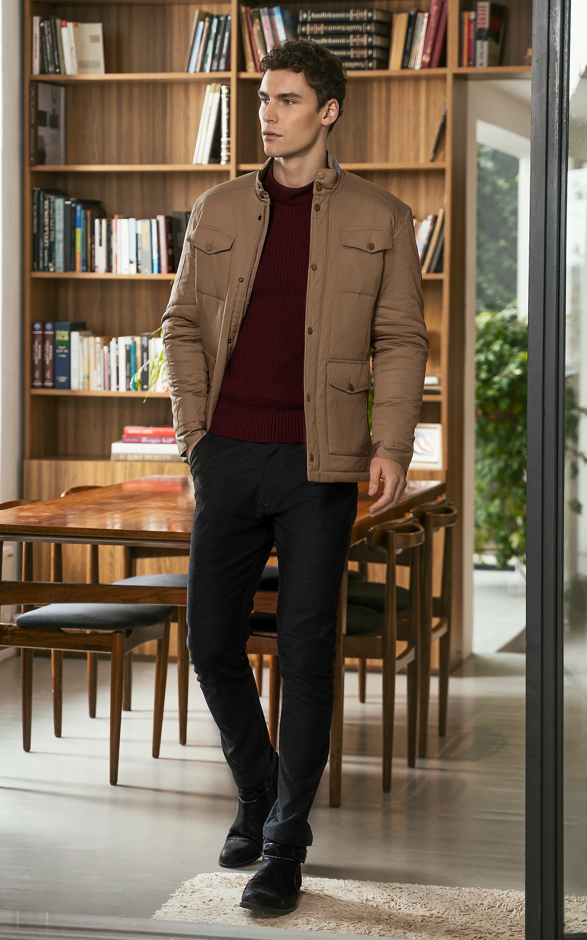 Khaki puffer jacket with snap buttons, stand collar, and chest pockets