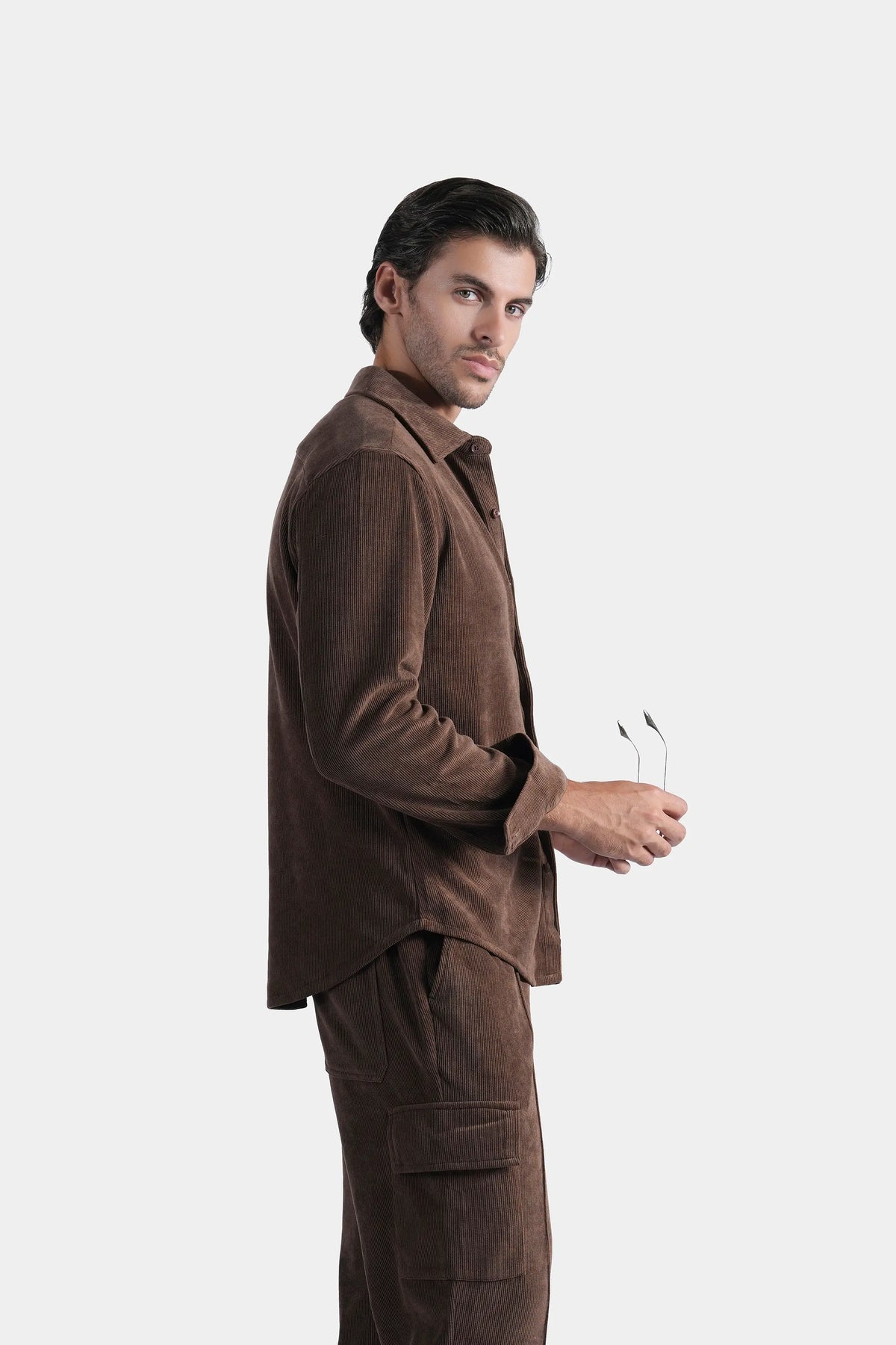 Brown button-up casual shirt with regular collar and front placket, side view