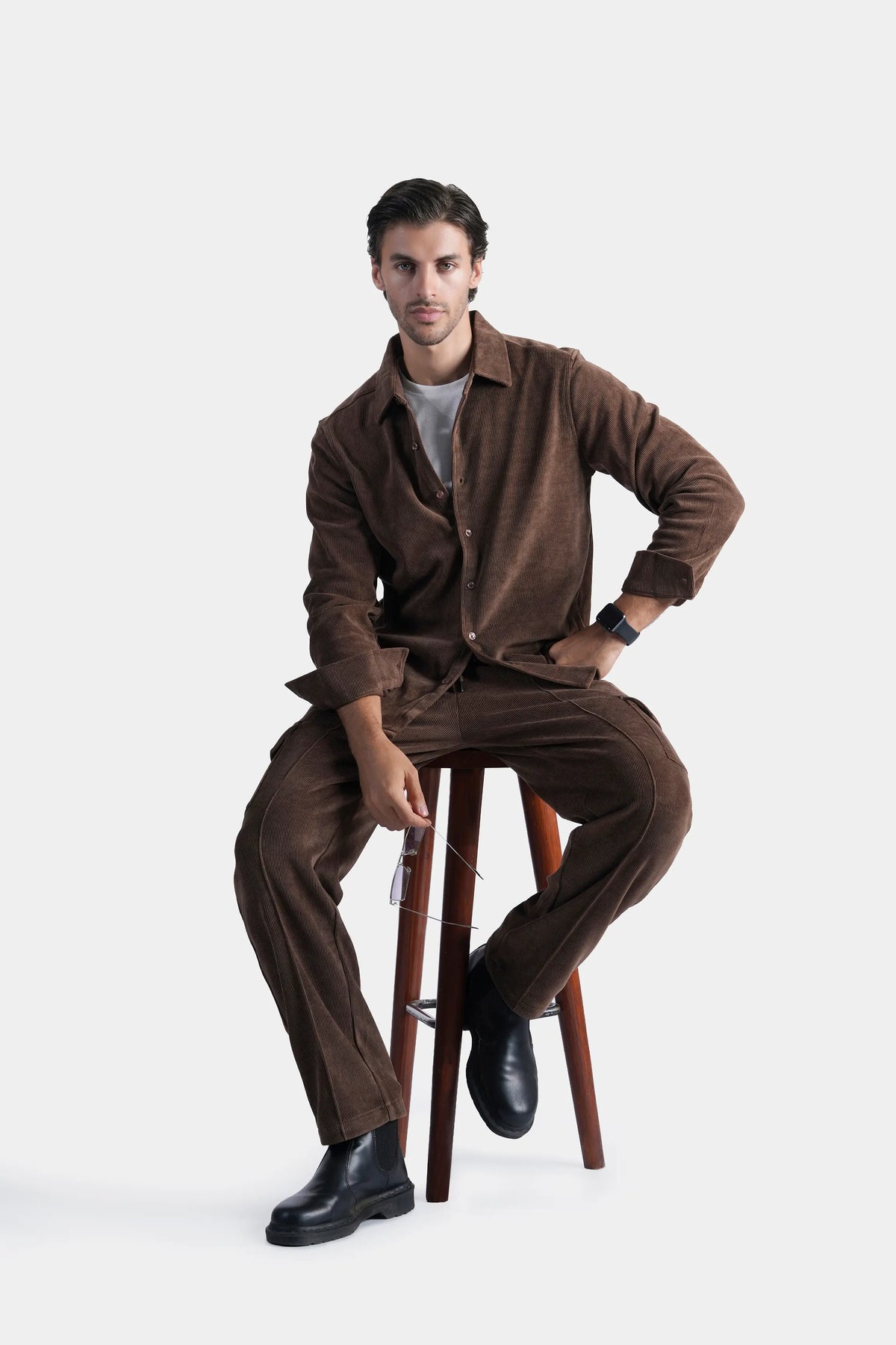 Brown button-up casual shirt, regular collar and long sleeves with cuffs visible