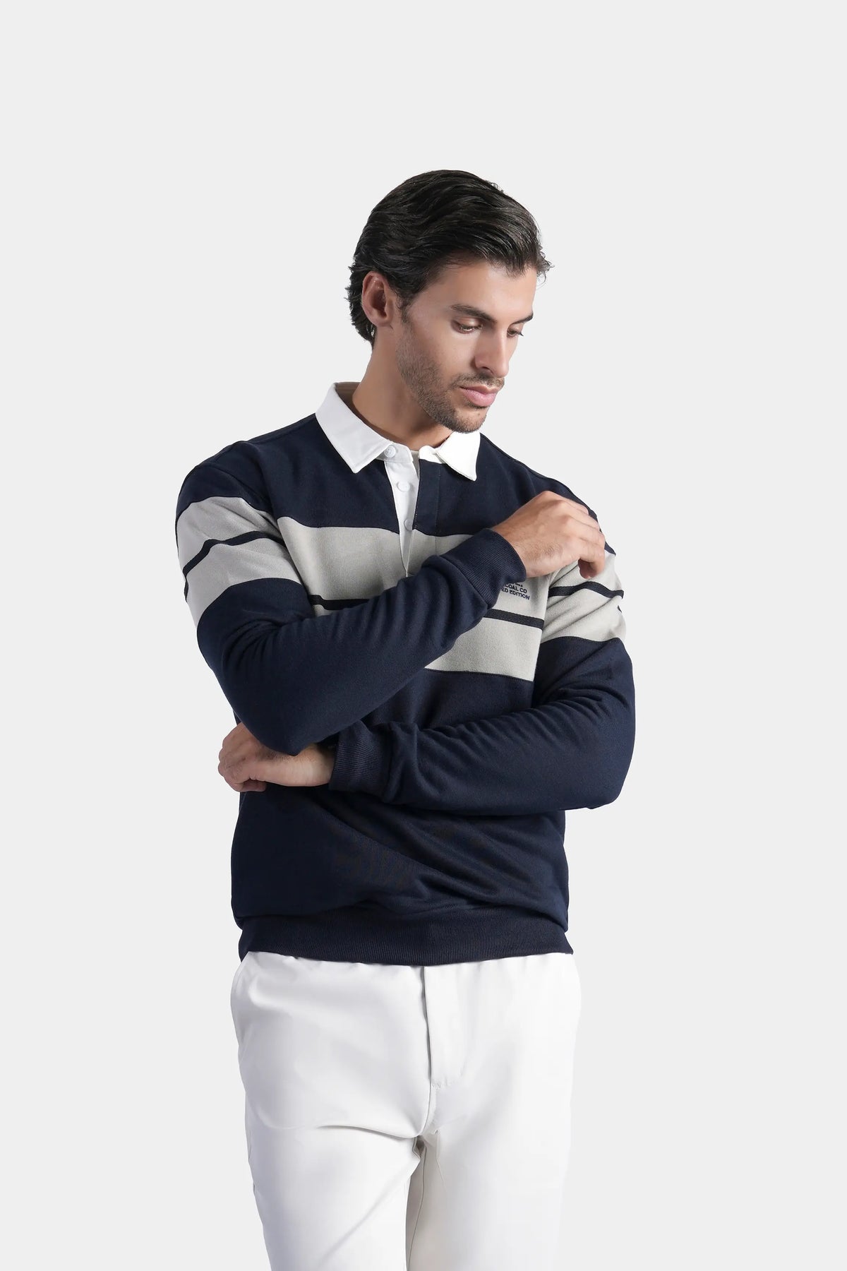 Navy long-sleeve rugby polo with white stripes and collared button placket