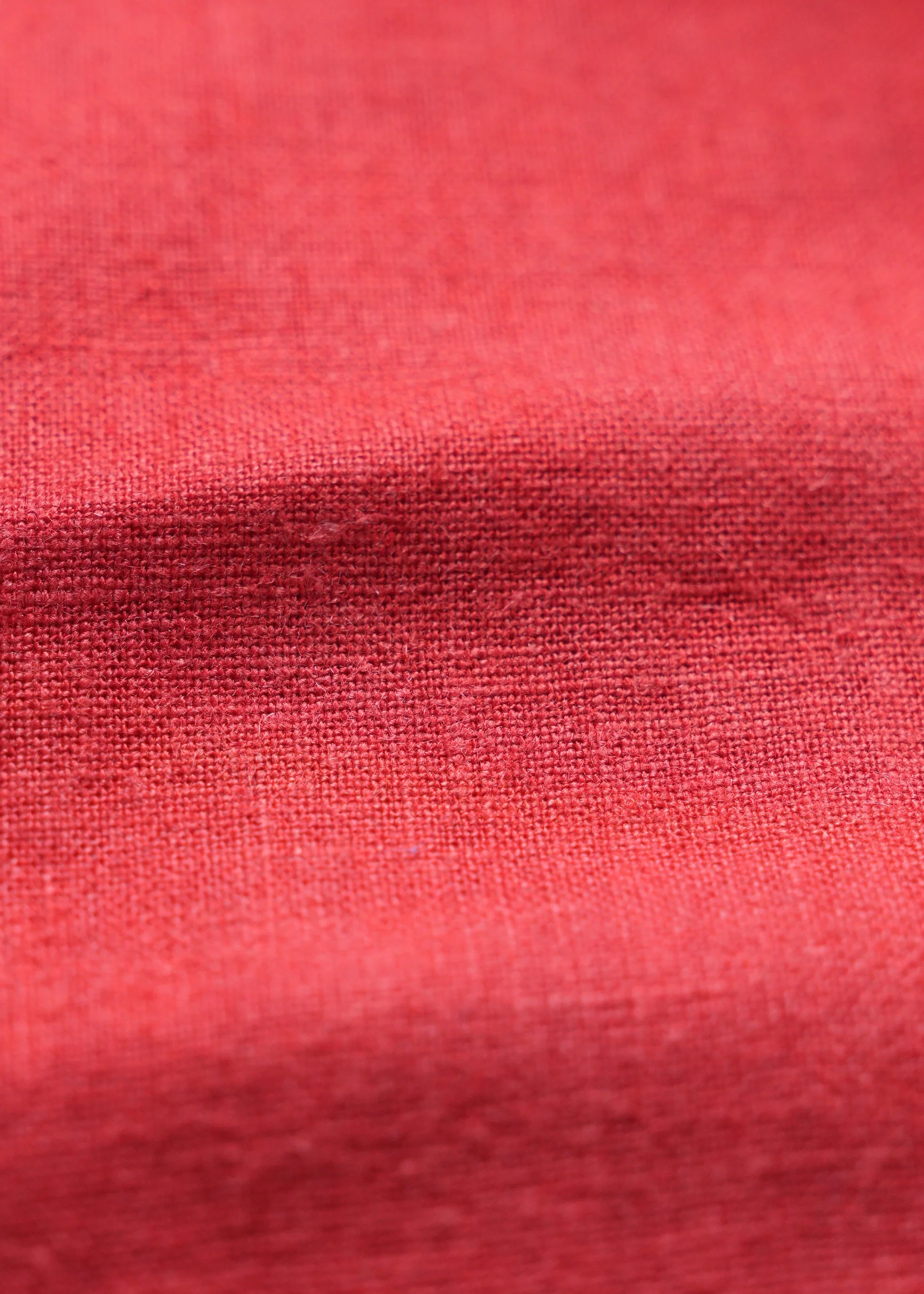 Tangerine linen fabric texture close-up