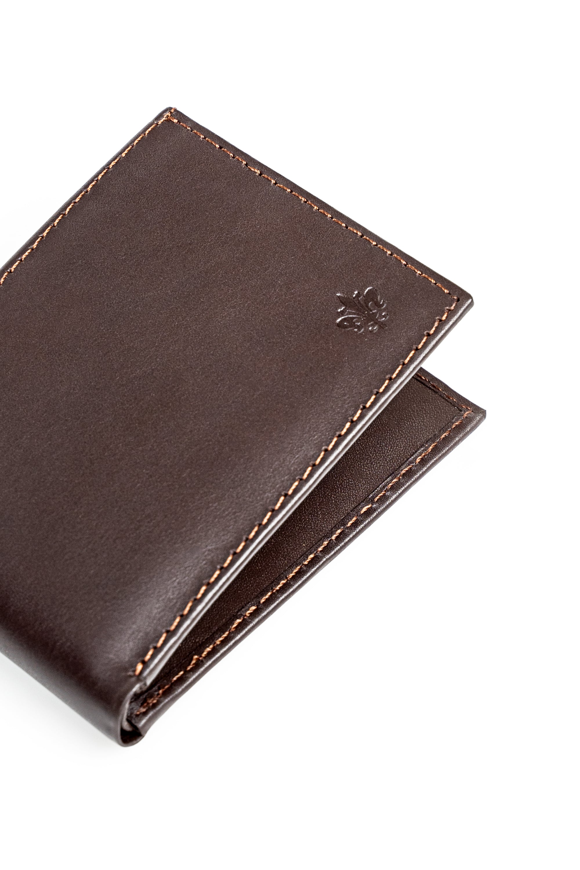 Brown leather wallet closeup with stitched trim and embossed emblem