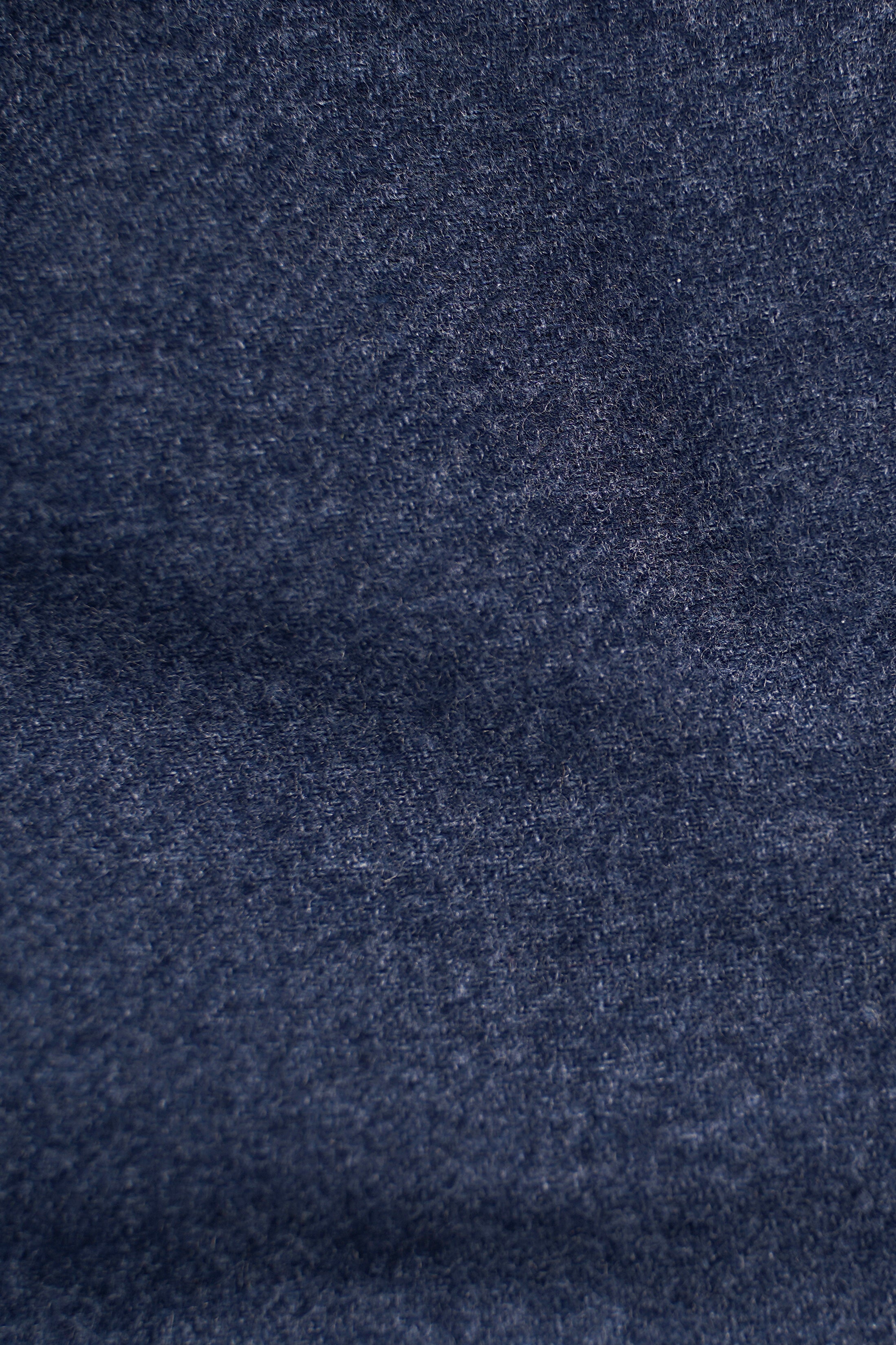 Woolen shirt fabric swatch in dark blue texture